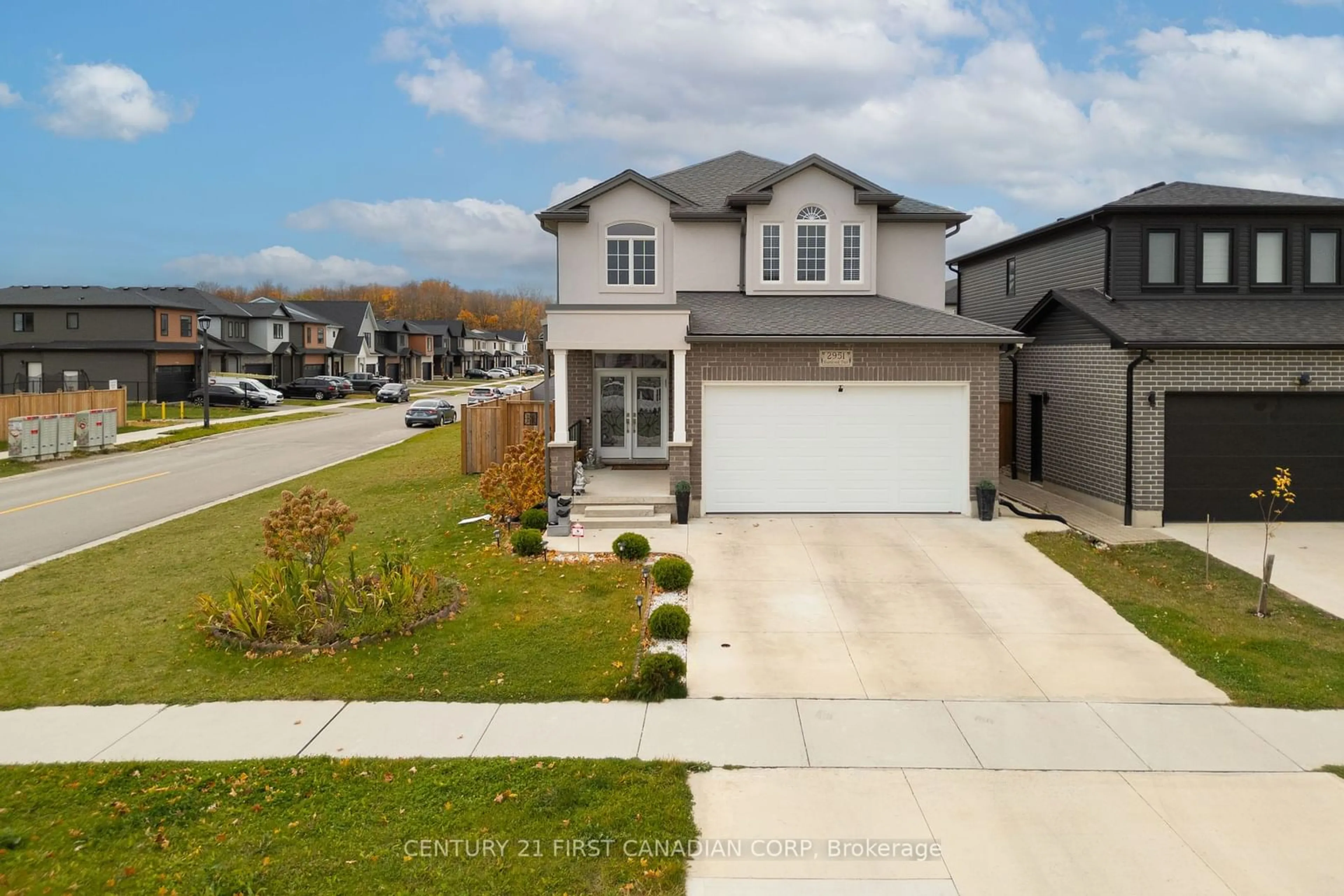 Frontside or backside of a home, the street view for 2951 Heardcreek Tr, London Ontario N6G 0X8