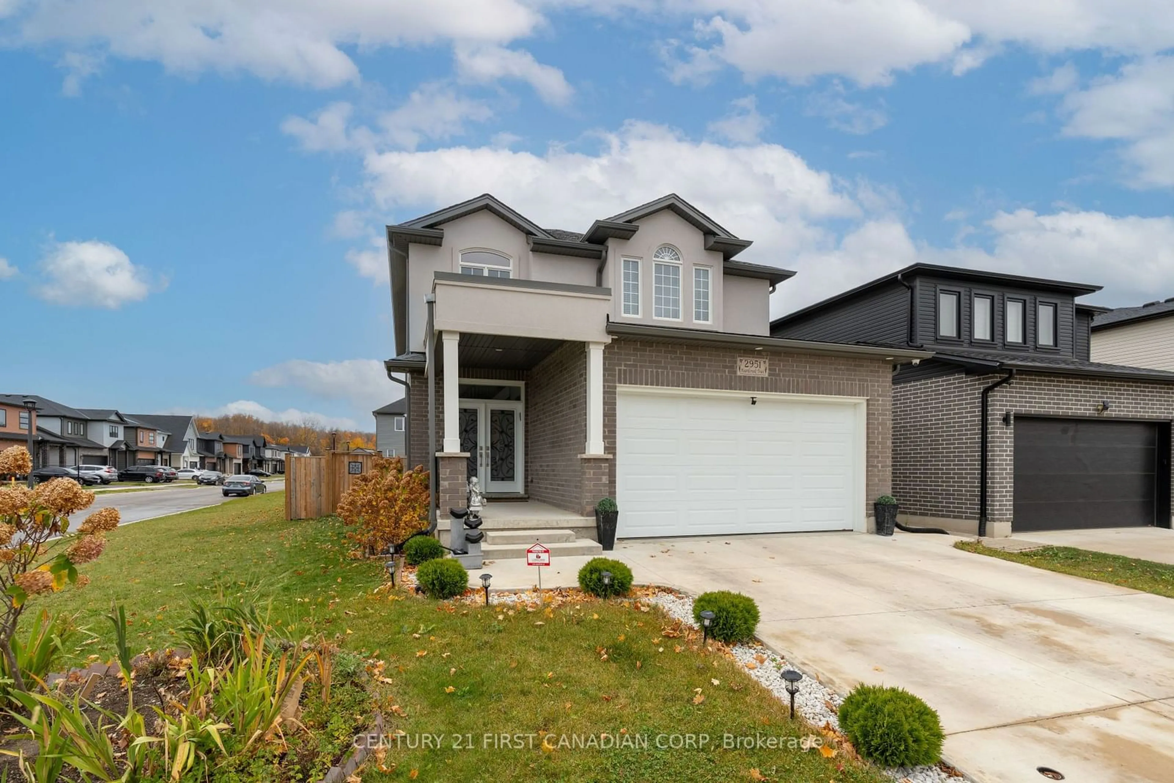 Frontside or backside of a home, the street view for 2951 Heardcreek Tr, London Ontario N6G 0X8