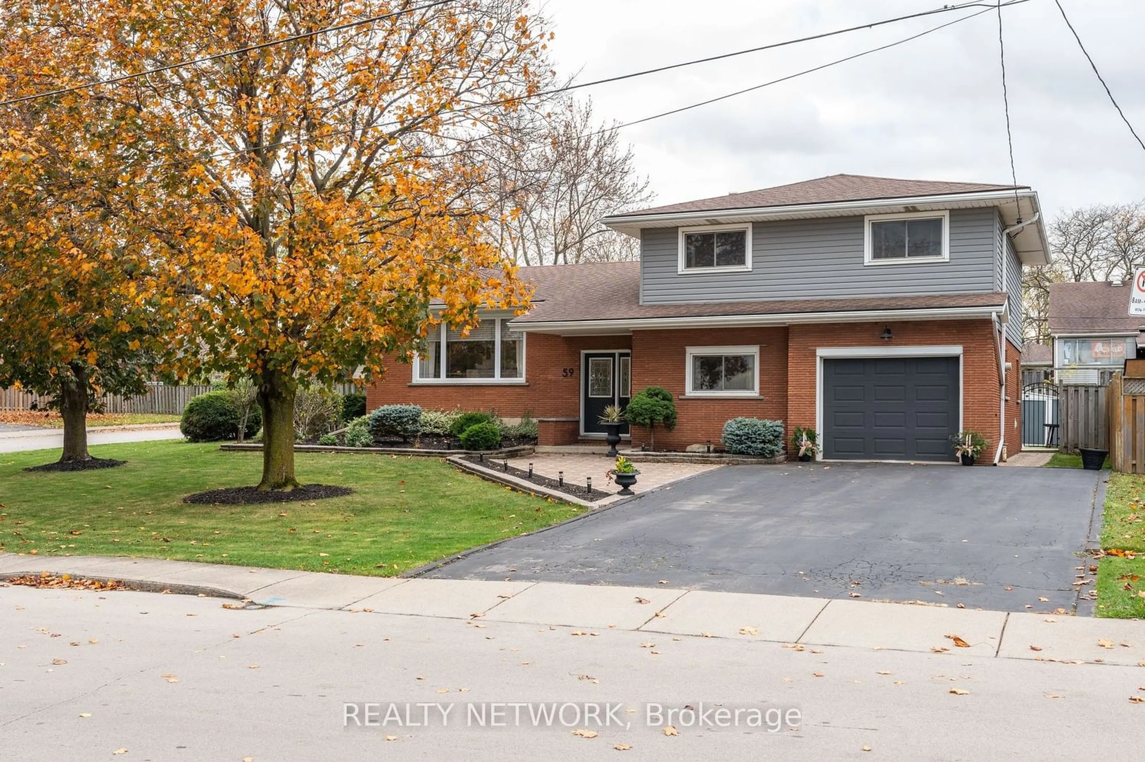 Frontside or backside of a home, the street view for 59 Felker Ave, Hamilton Ontario L8G 2L9