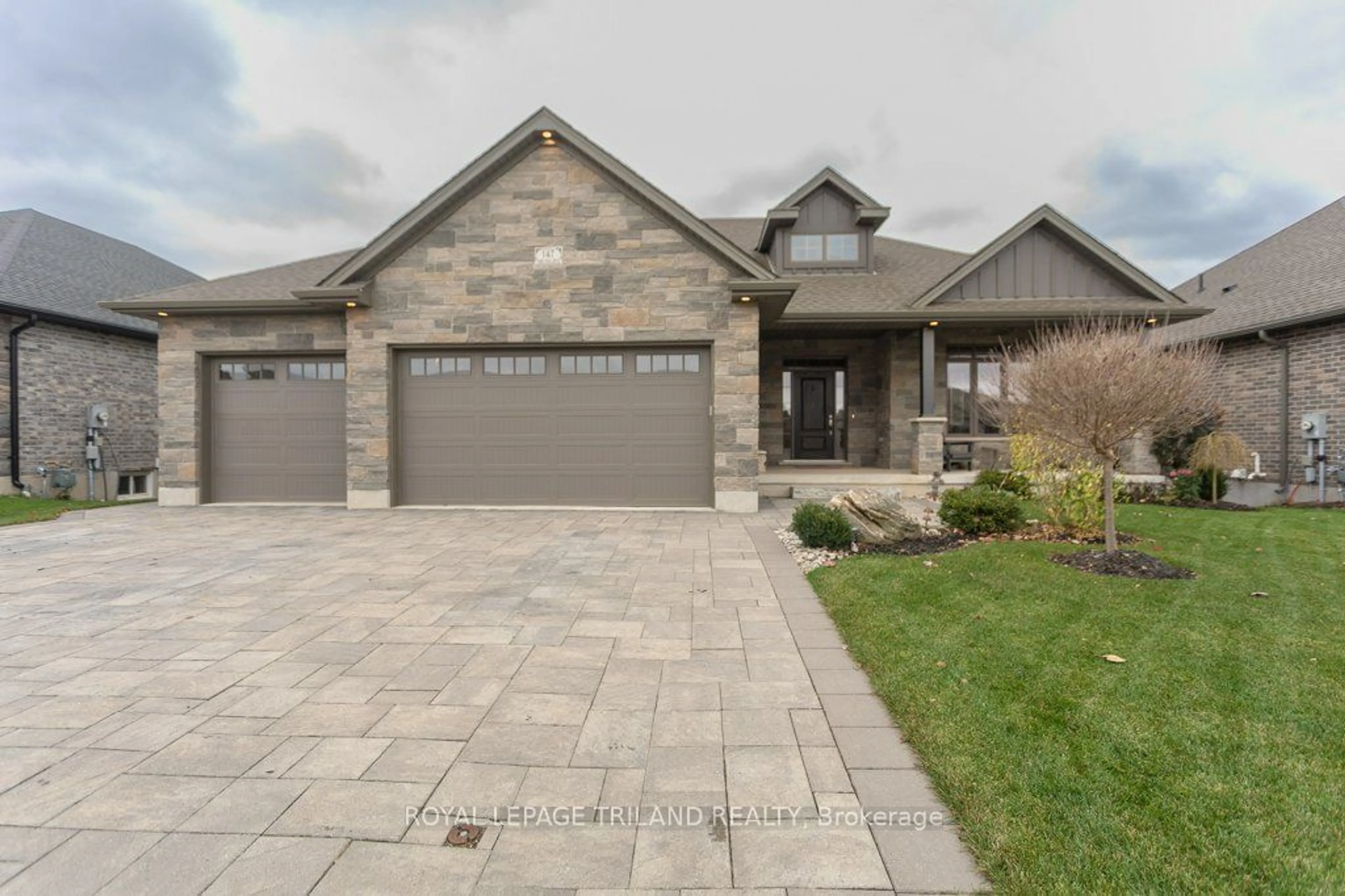 Frontside or backside of a home, the street view for 147 Robin Ridge Dr, Central Elgin Ontario N0L 1B0