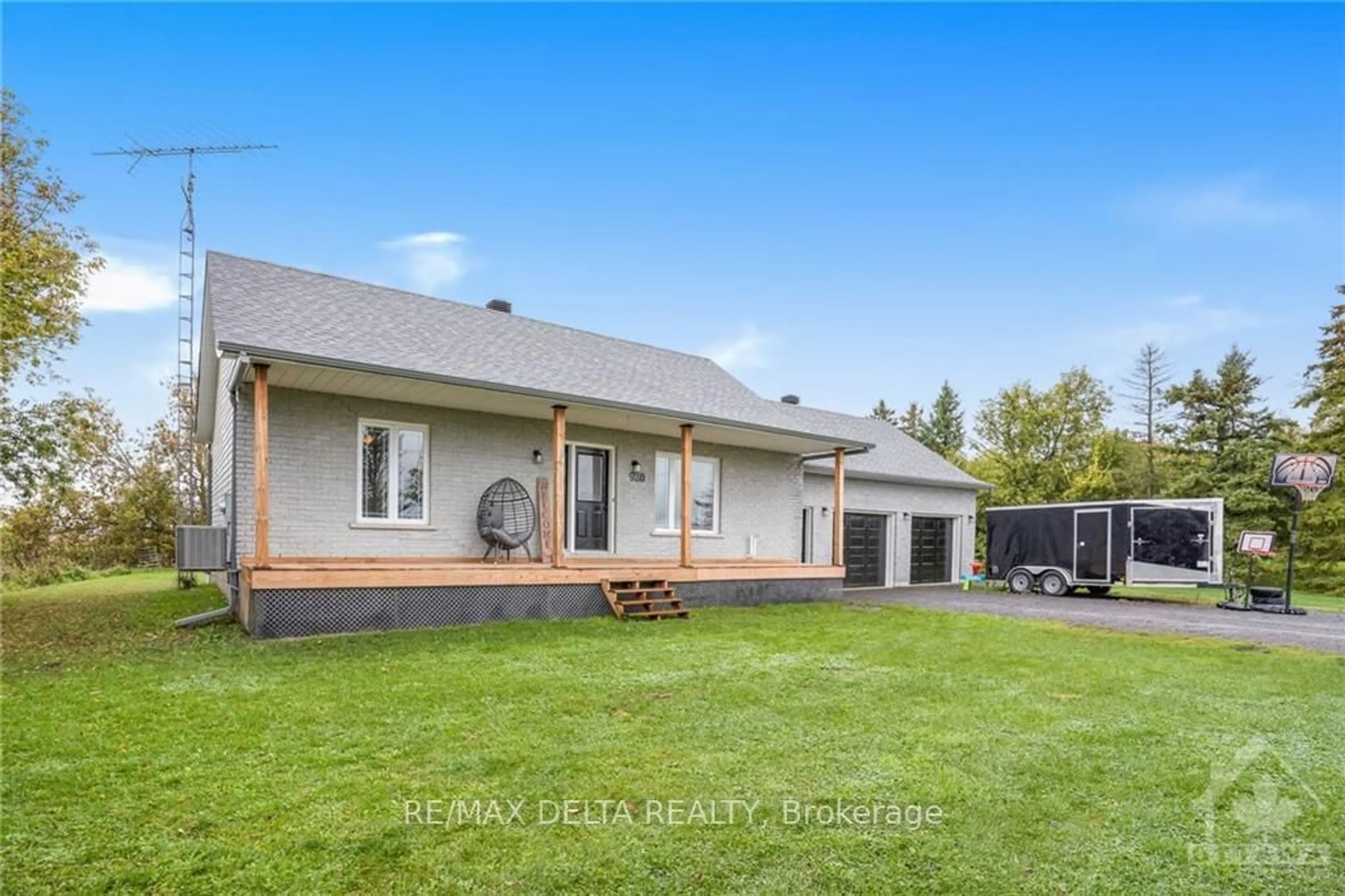 Frontside or backside of a home, the fenced backyard for 920 COUNTY RD 23 Rd, The Nation Ontario K0B 1R0