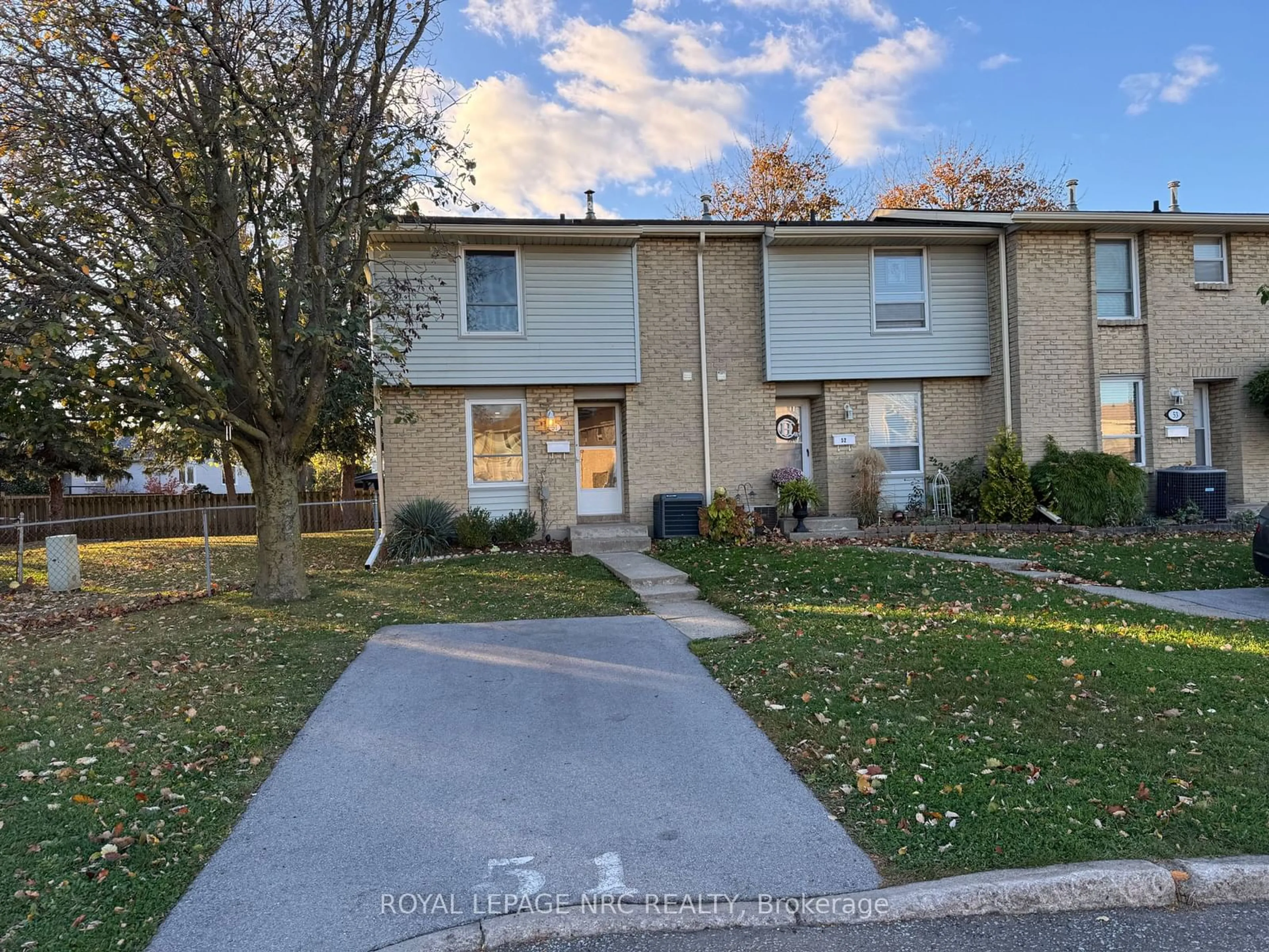 A pic from exterior of the house or condo, the street view for 242 Lakeport Rd #51, St. Catharines Ontario L2N 6V2