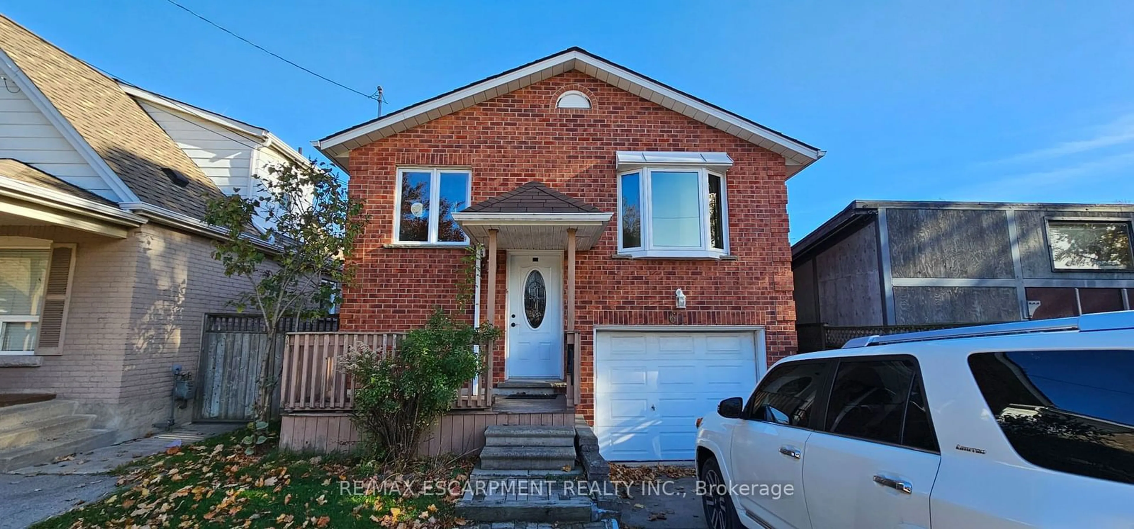 Frontside or backside of a home, the street view for 61 East 26th St, Hamilton Ontario L8V 3C3