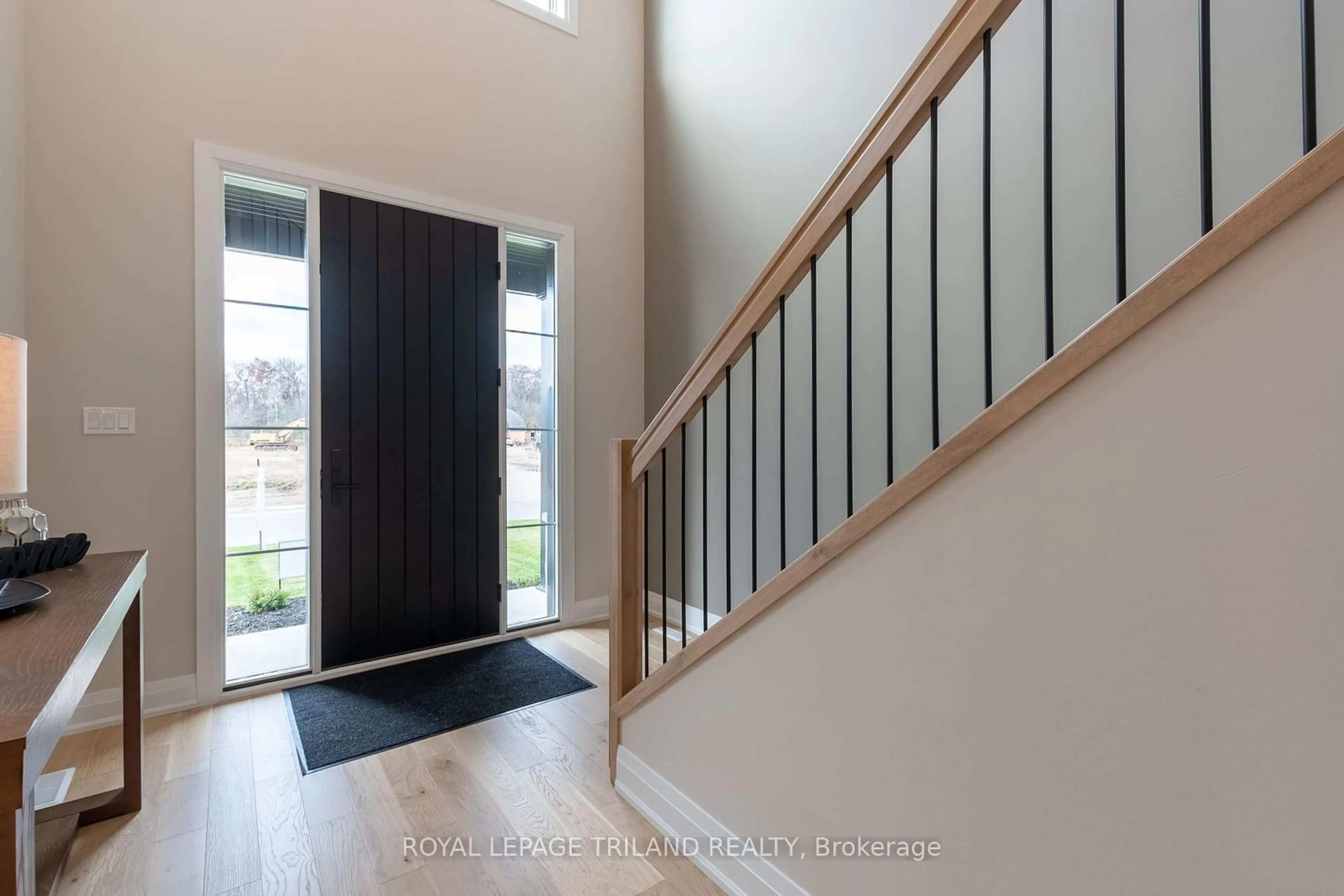 Indoor entryway, wood floors for 16 Allister Dr, Middlesex Centre Ontario N0L 1R0