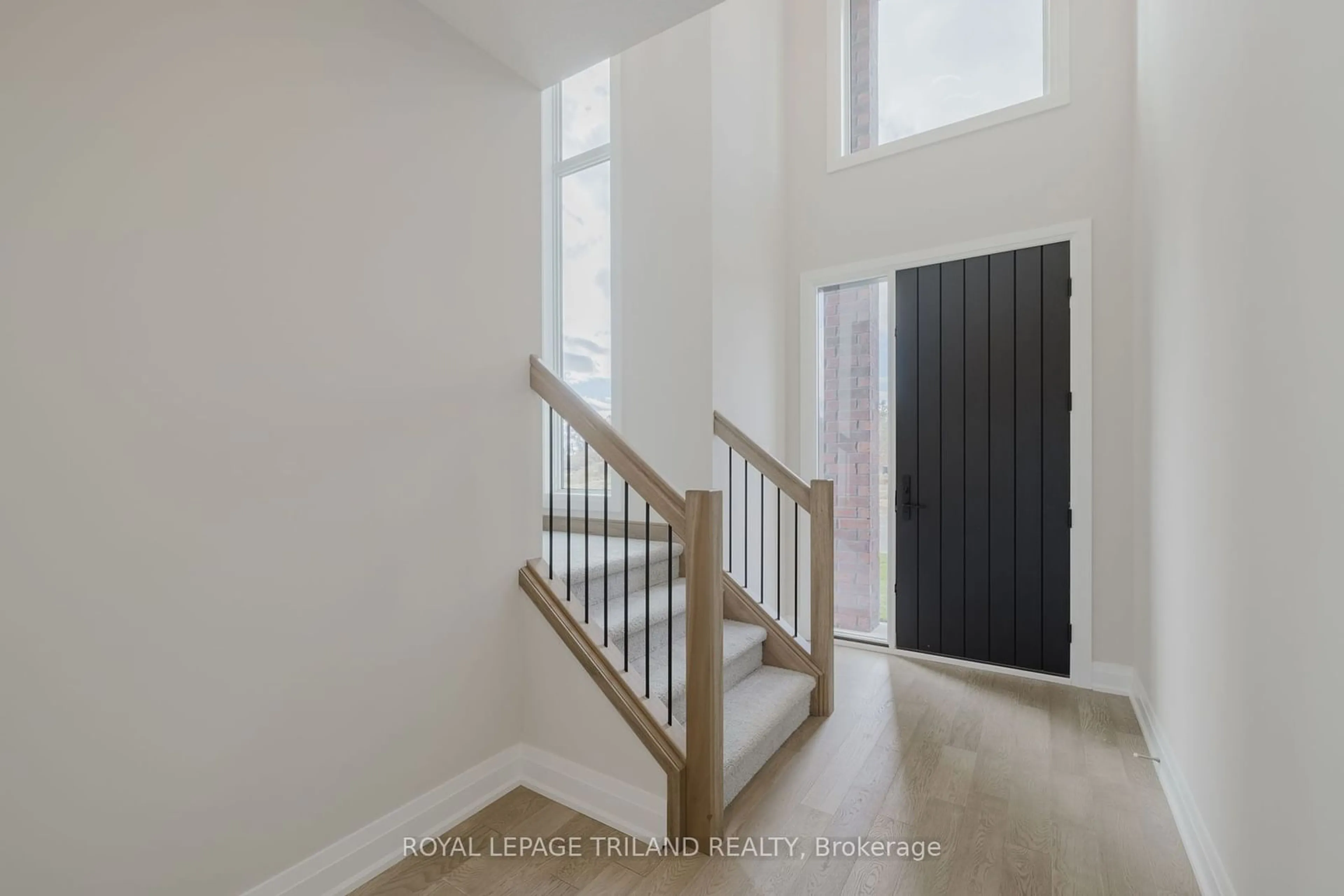 Indoor entryway, wood floors for 20 Allister Dr, Middlesex Centre Ontario N0L 1R0