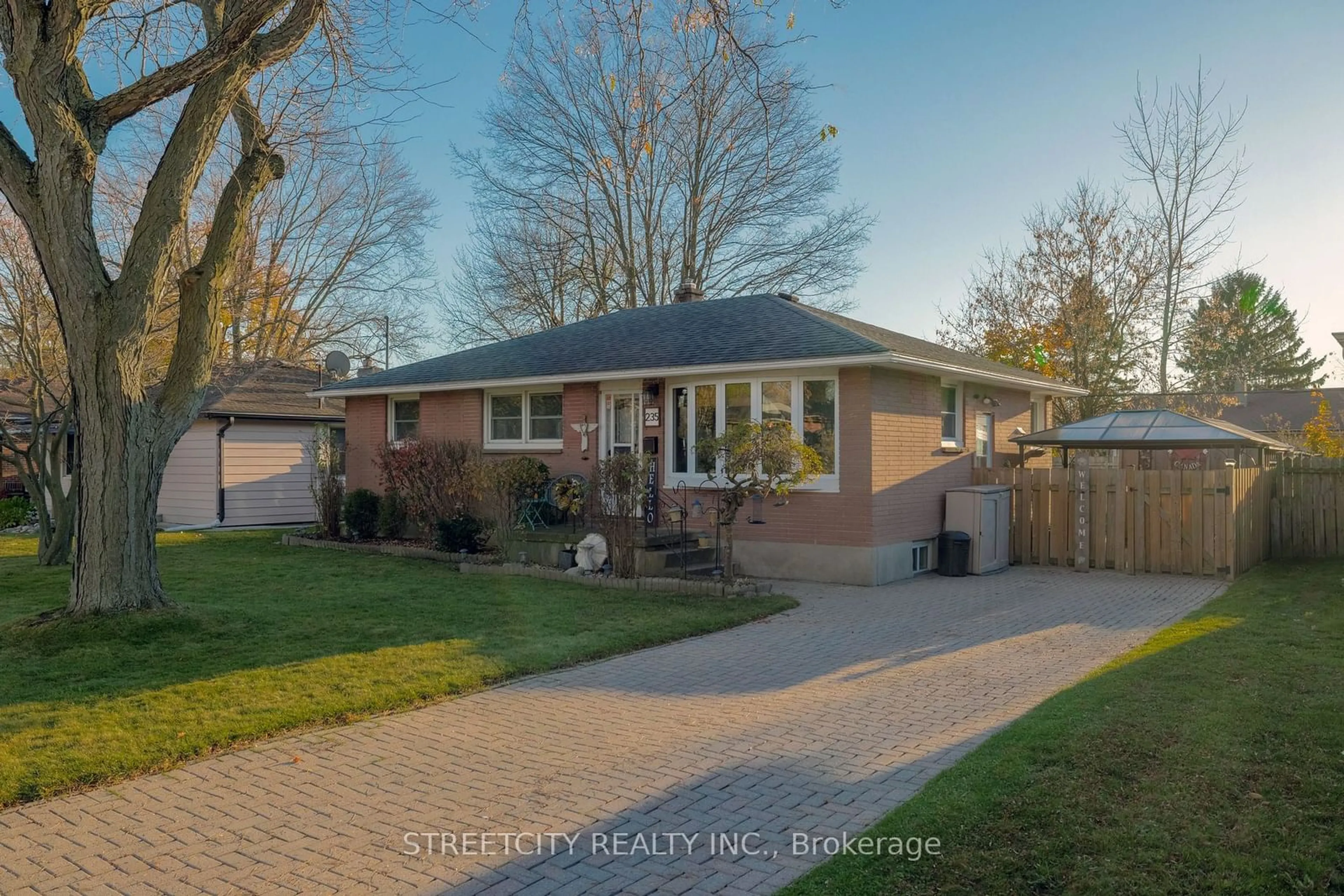 Frontside or backside of a home, the street view for 235 MERLIN Cres, London Ontario N5W 5A2