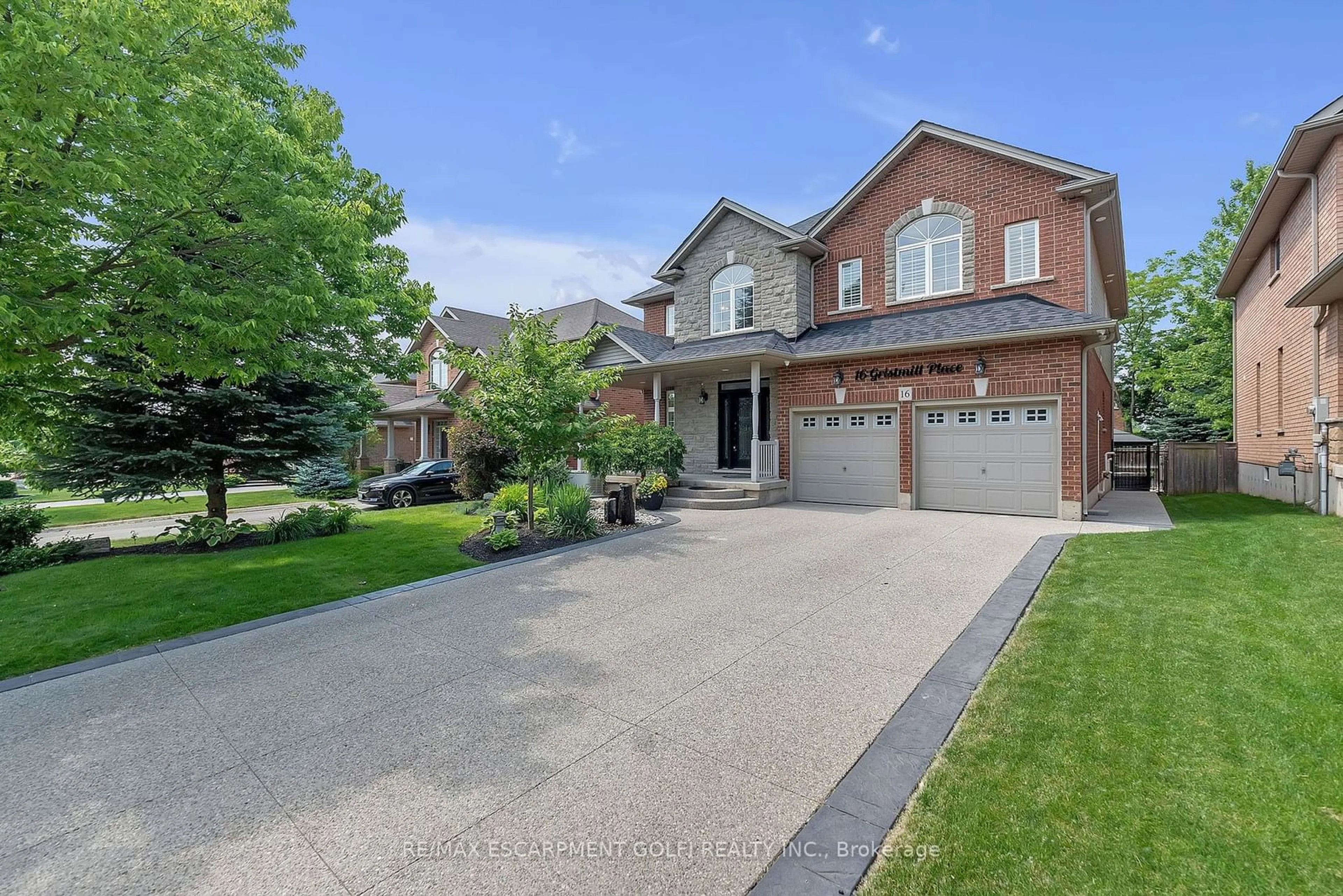 Frontside or backside of a home, the street view for 16 Gristmill Pl, Hamilton Ontario L9G 5C9