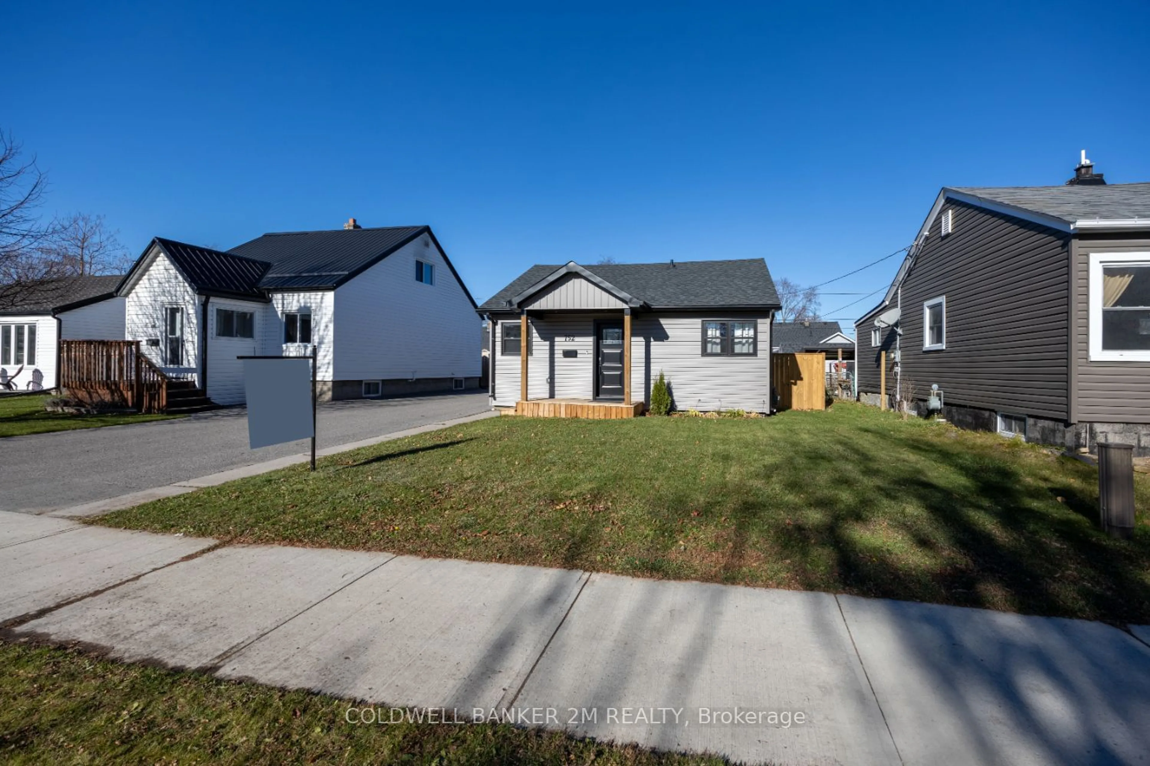 Frontside or backside of a home, the fenced backyard for 752 St. Mary's St, Peterborough Ontario K9J 4H2