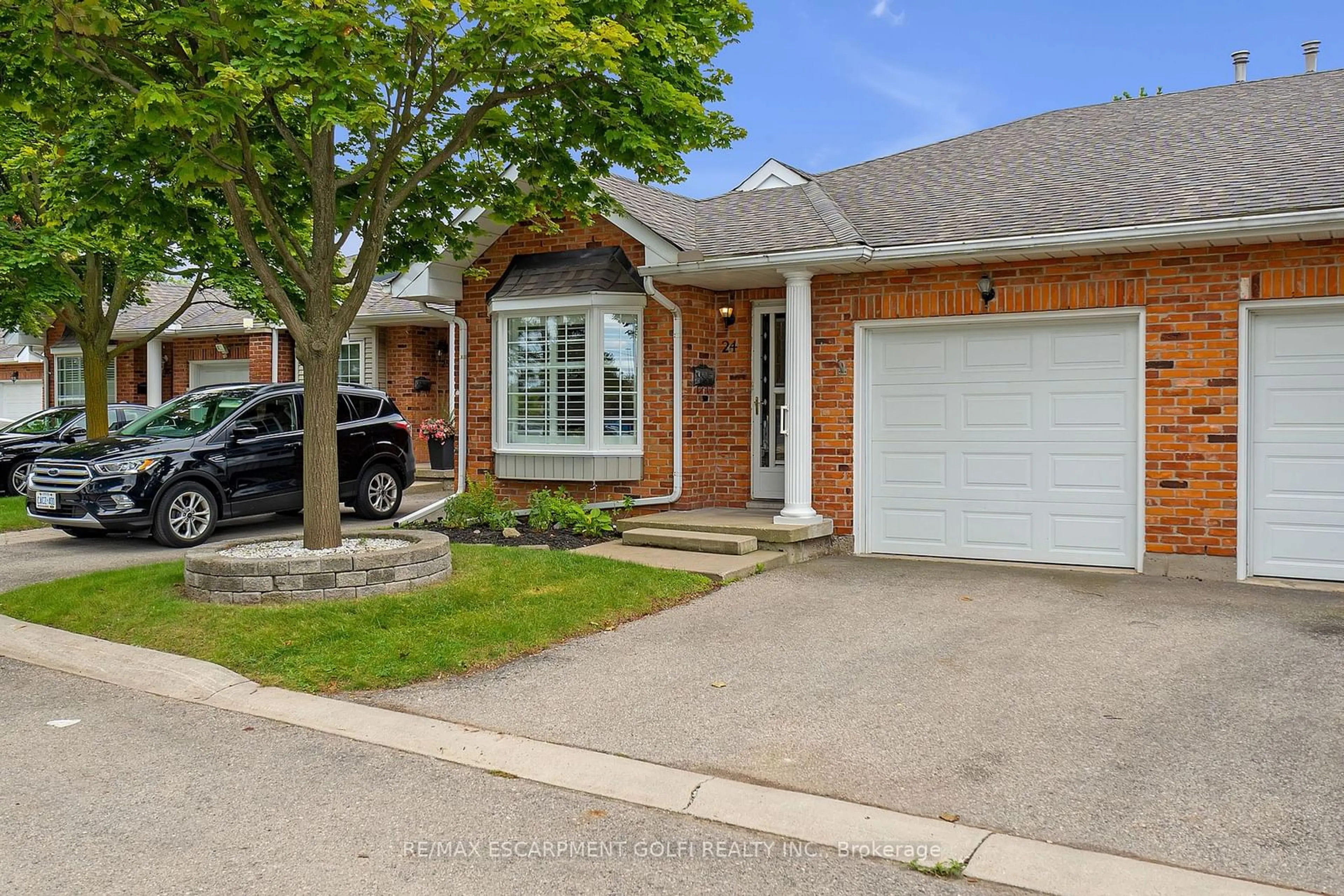 Frontside or backside of a home, cottage for 20 Meadowlands Blvd #24, Hamilton Ontario L9K 1J5