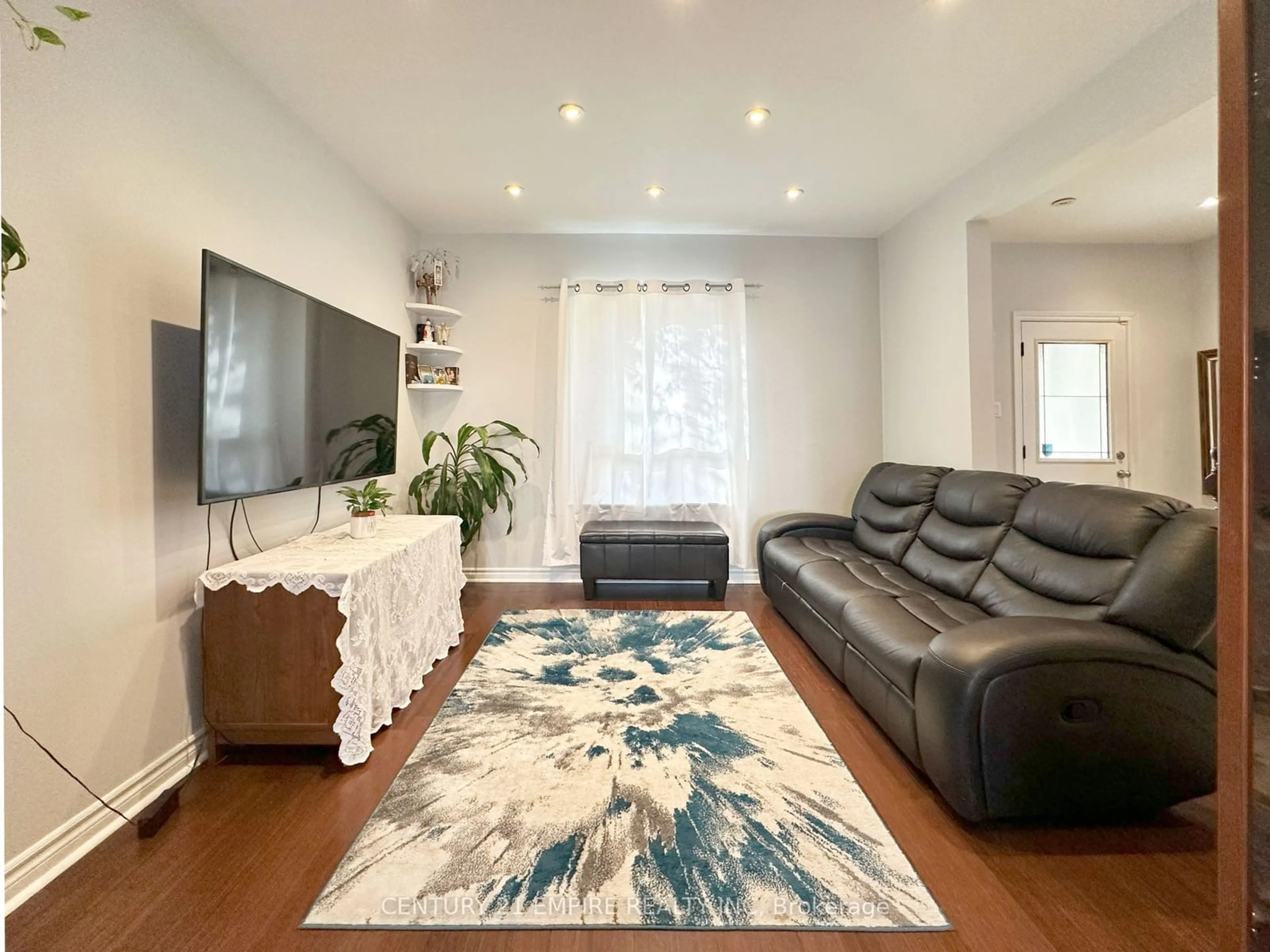 Living room, wood floors for 61 Francis St, Hamilton Ontario L8L 3V2