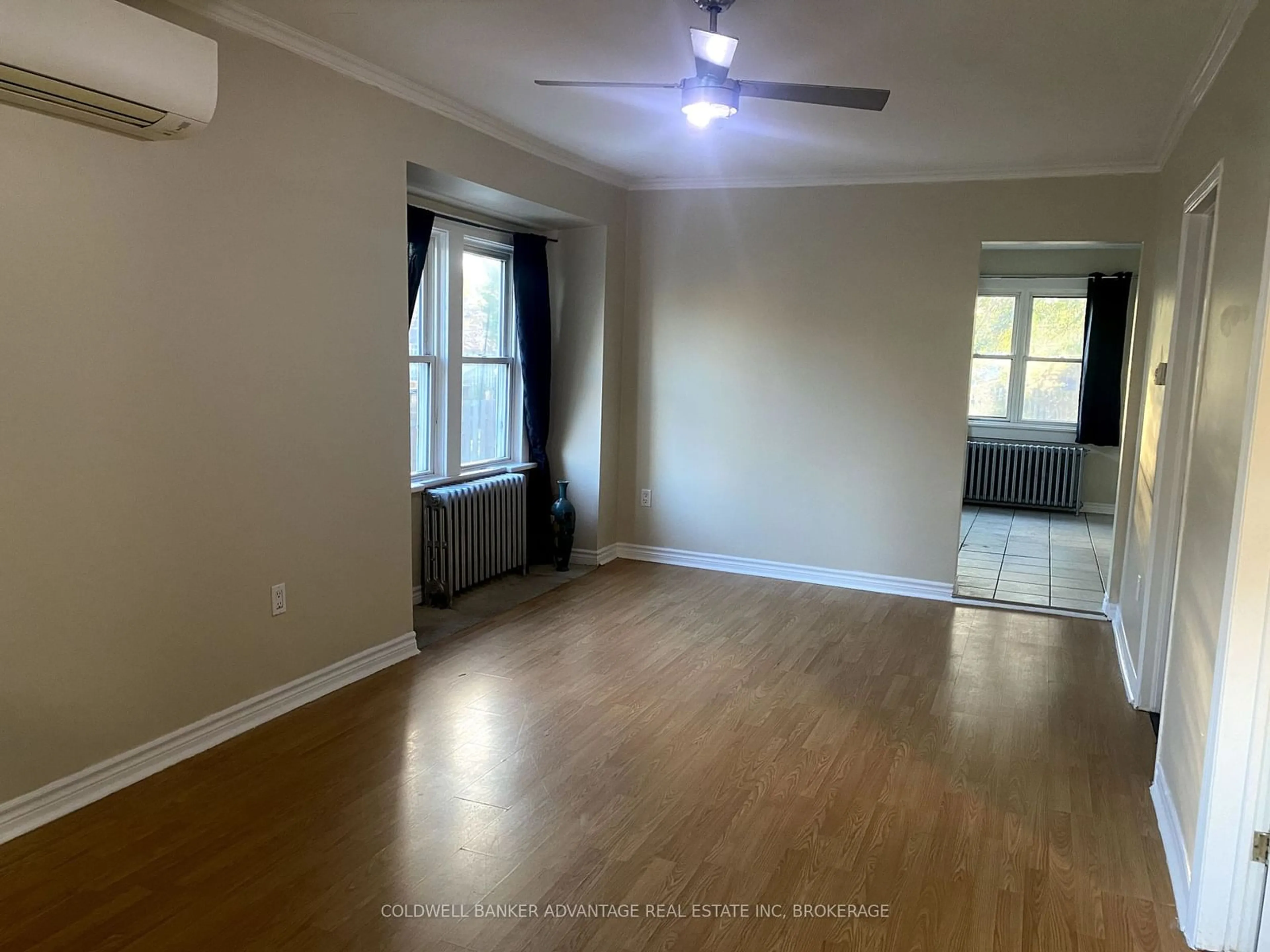 A pic of a room, wood floors for 54 Lloyd St, St. Catharines Ontario L2S 2N9