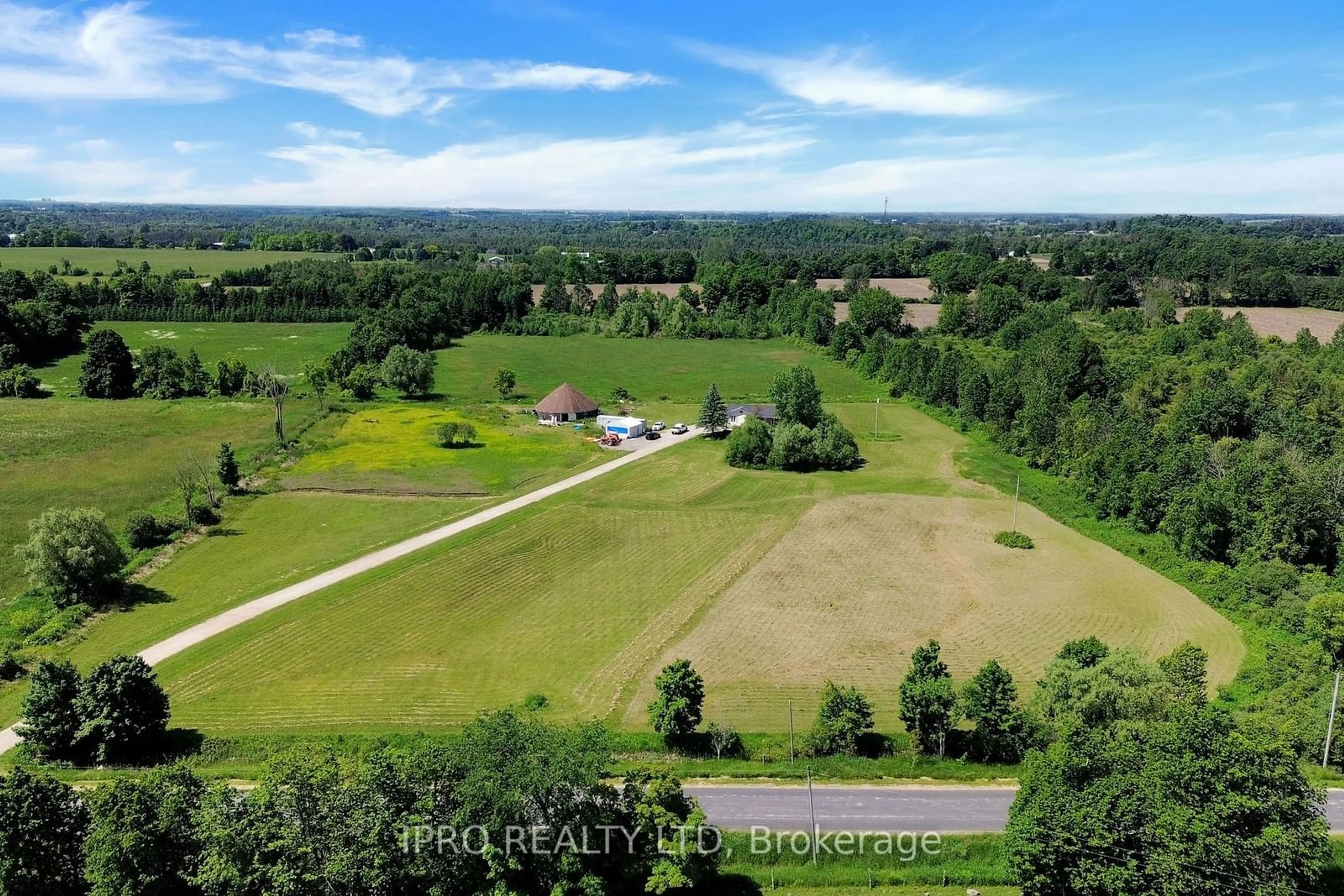 A pic from exterior of the house or condo, the fenced backyard for 5106 Seventh Line, Guelph/Eramosa Ontario N0B 2K0