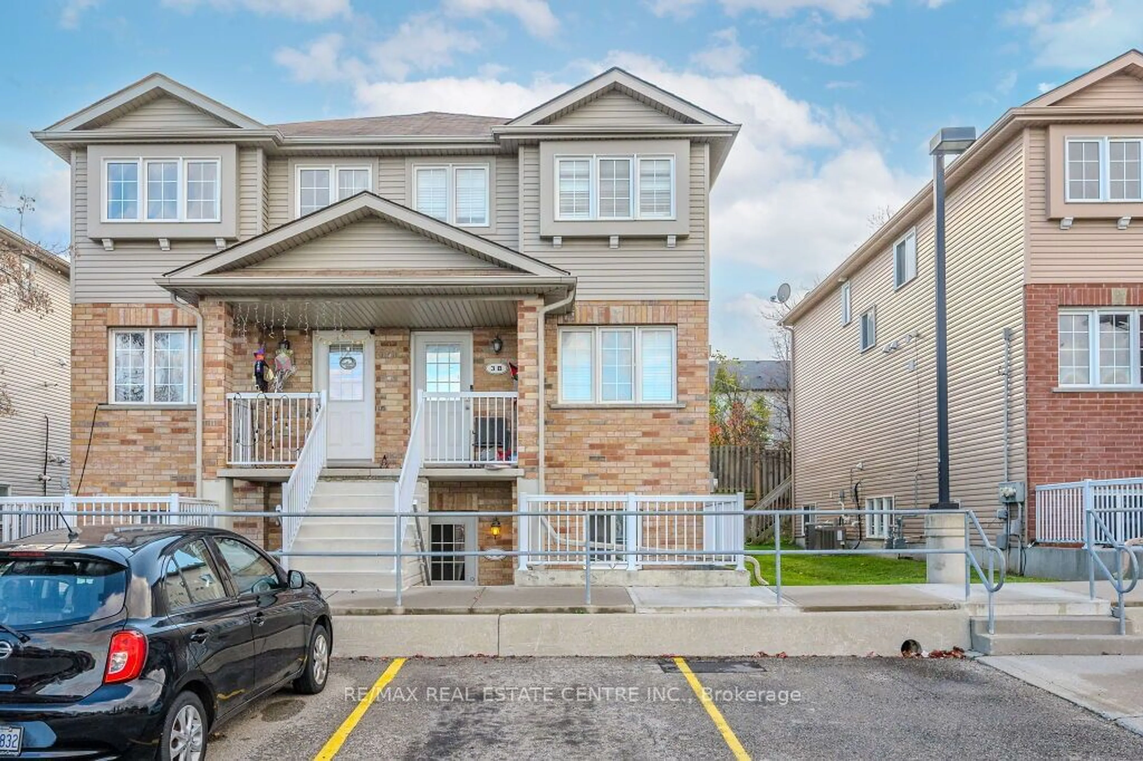 A pic from exterior of the house or condo, the street view for 50 Howe Dr #3D, Waterloo Ontario N2E 0A3