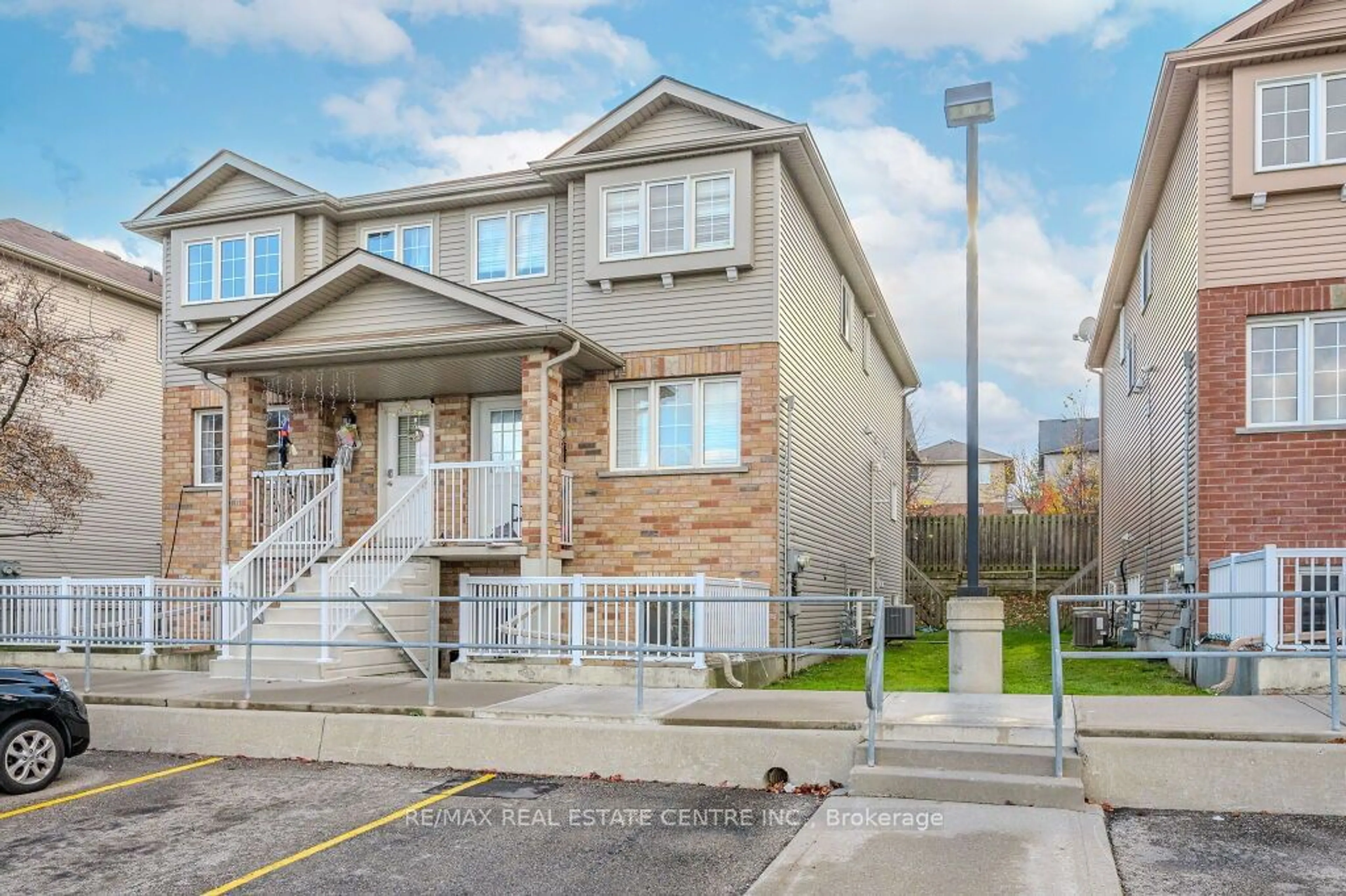 A pic from exterior of the house or condo, the street view for 50 Howe Dr #3D, Waterloo Ontario N2E 0A3