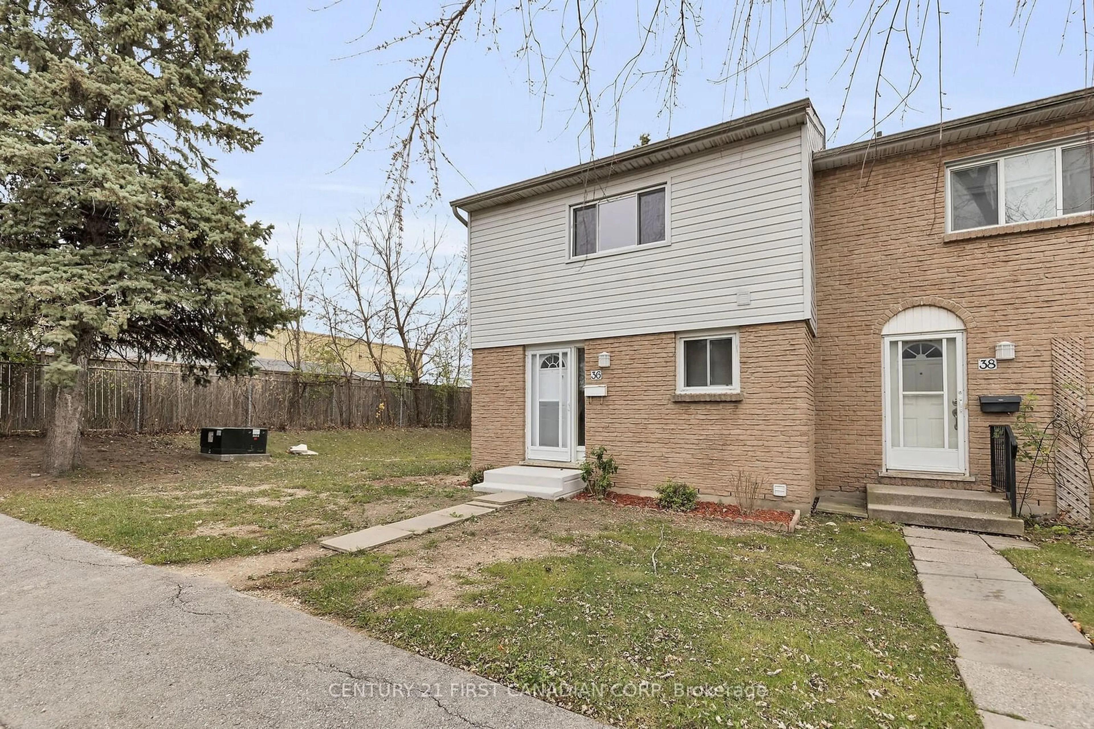 A pic from exterior of the house or condo, the fenced backyard for 1775 Culver Dr #36, London Ontario N5V 3H6