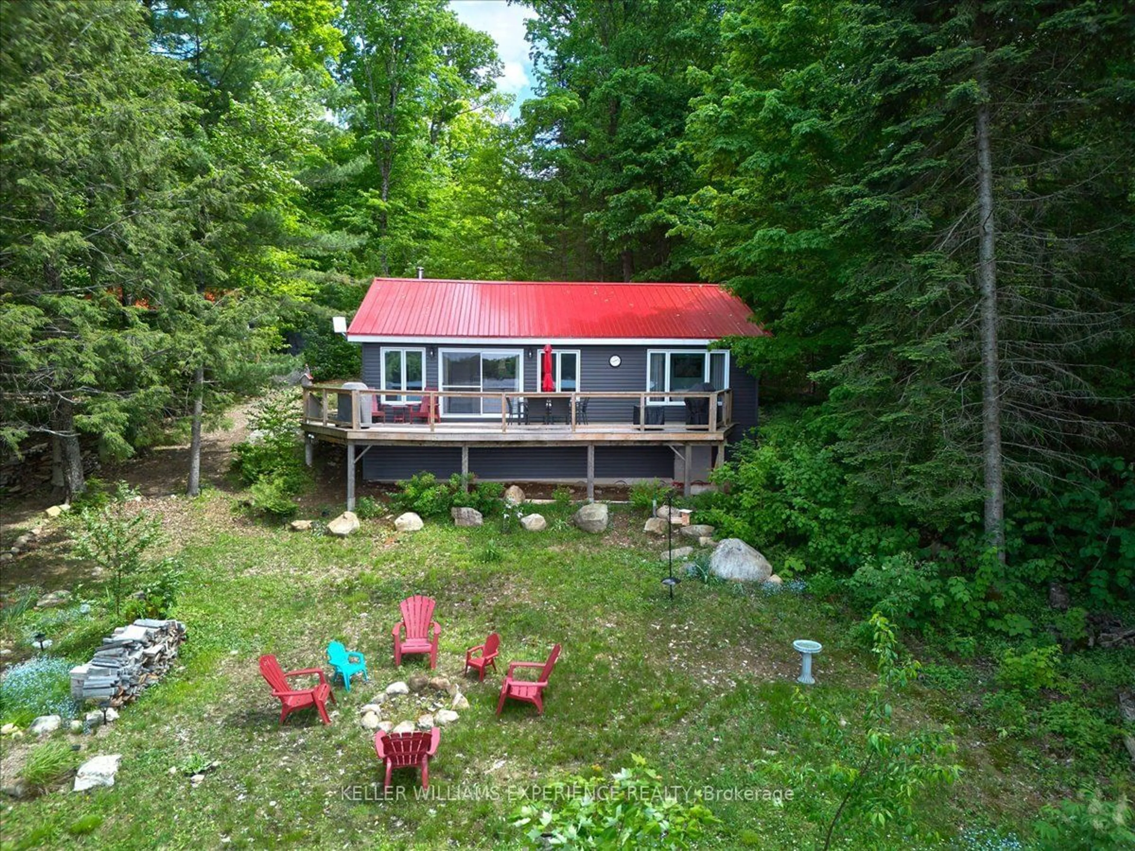 A pic from exterior of the house or condo, cottage for 1123 Whispering Pines Tr, Bracebridge Ontario P1L 1X3