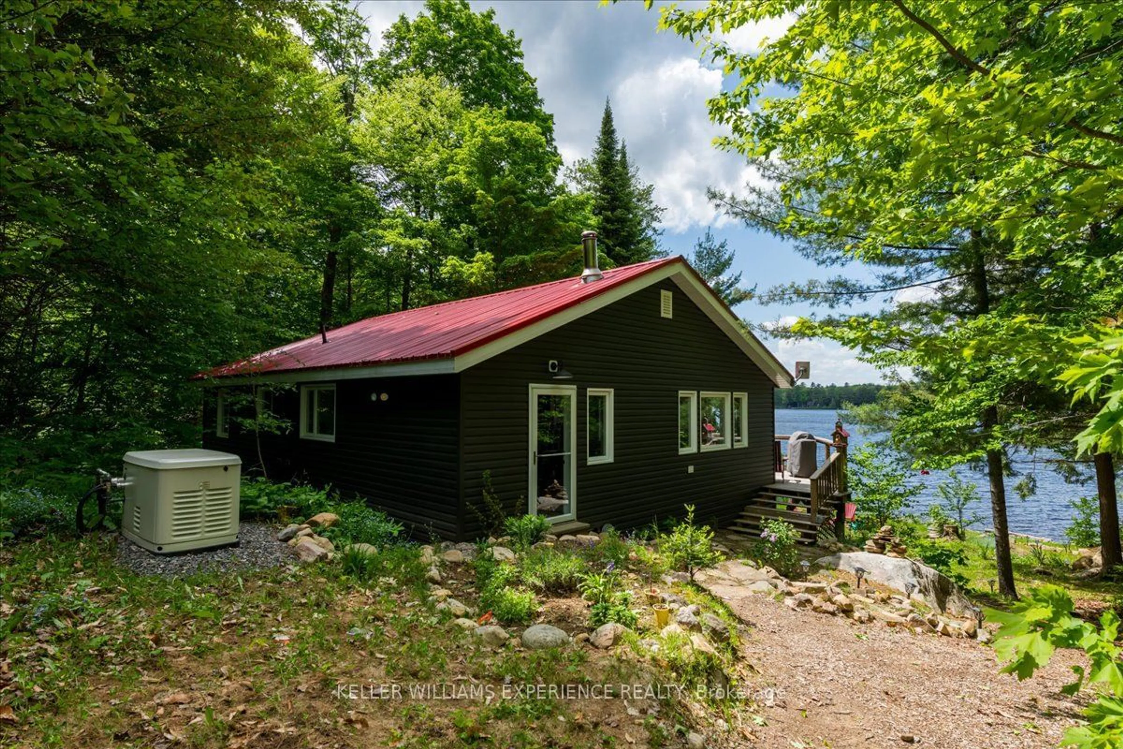 A pic from exterior of the house or condo, cottage for 1123 Whispering Pines Tr, Bracebridge Ontario P1L 1X3