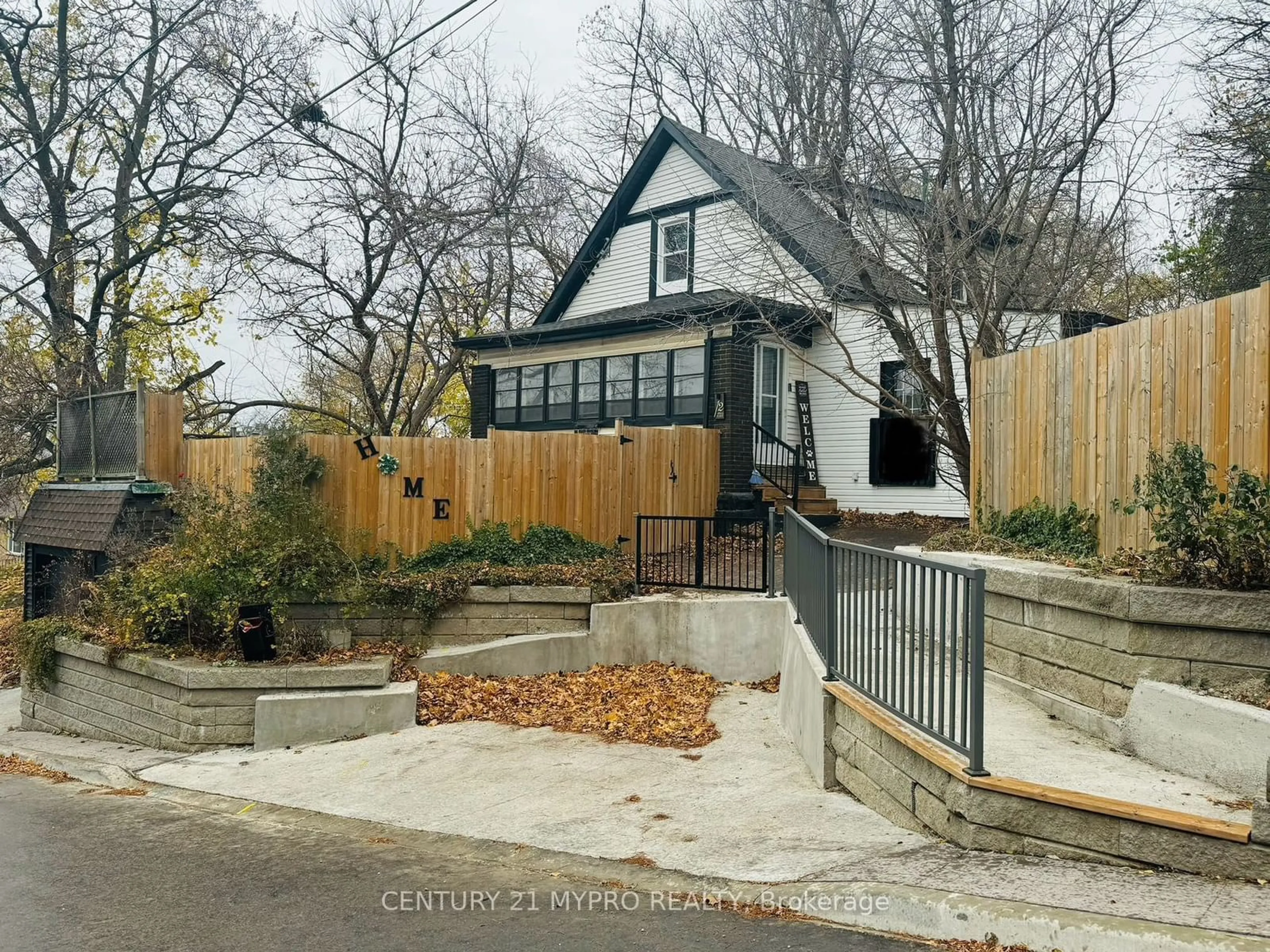 Frontside or backside of a home, the fenced backyard for 12 Hebel Pl, Kitchener Ontario N2G 3J4