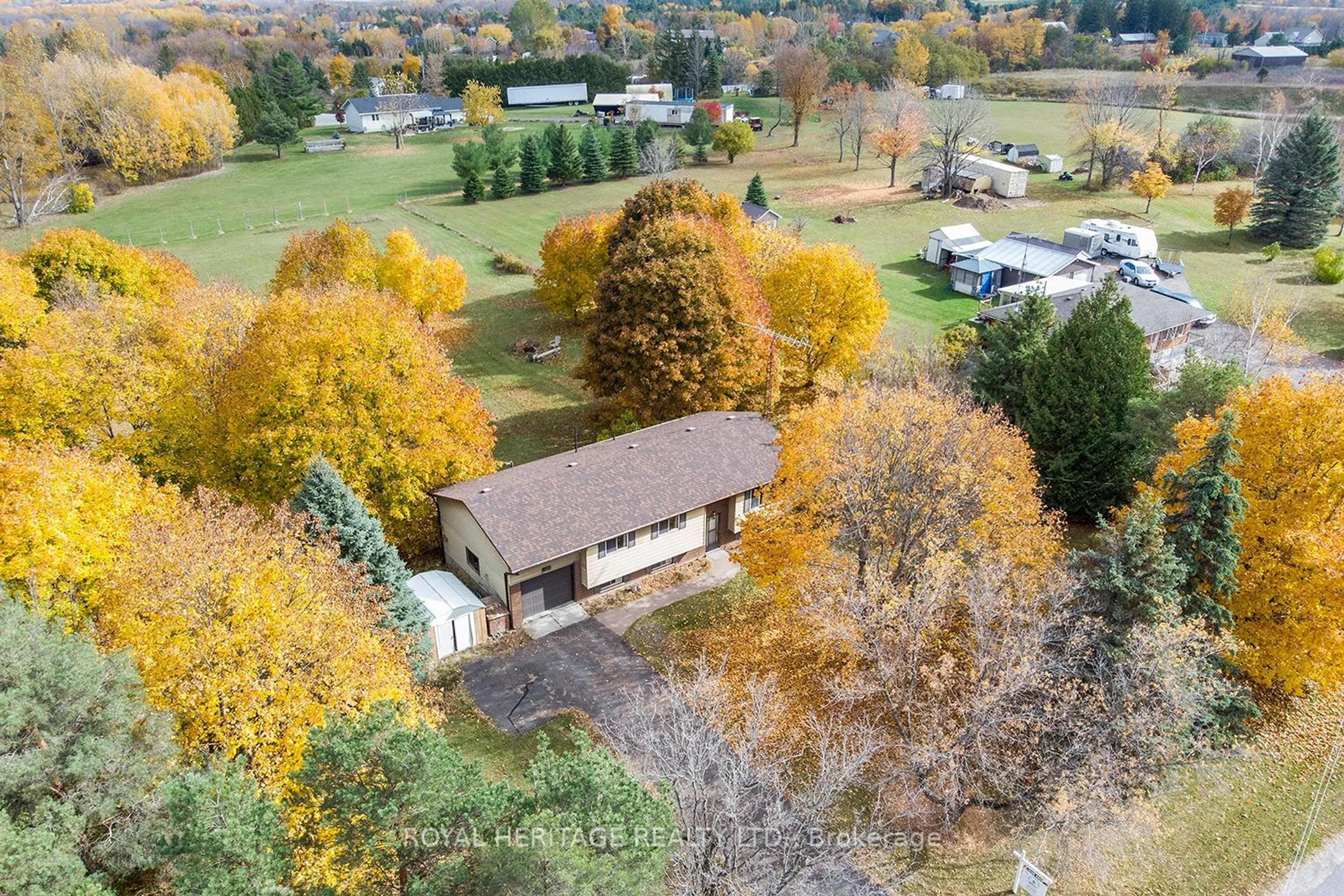 A pic from exterior of the house or condo, the fenced backyard for 23 Valley Rd, Cavan Monaghan Ontario L0A 1G0