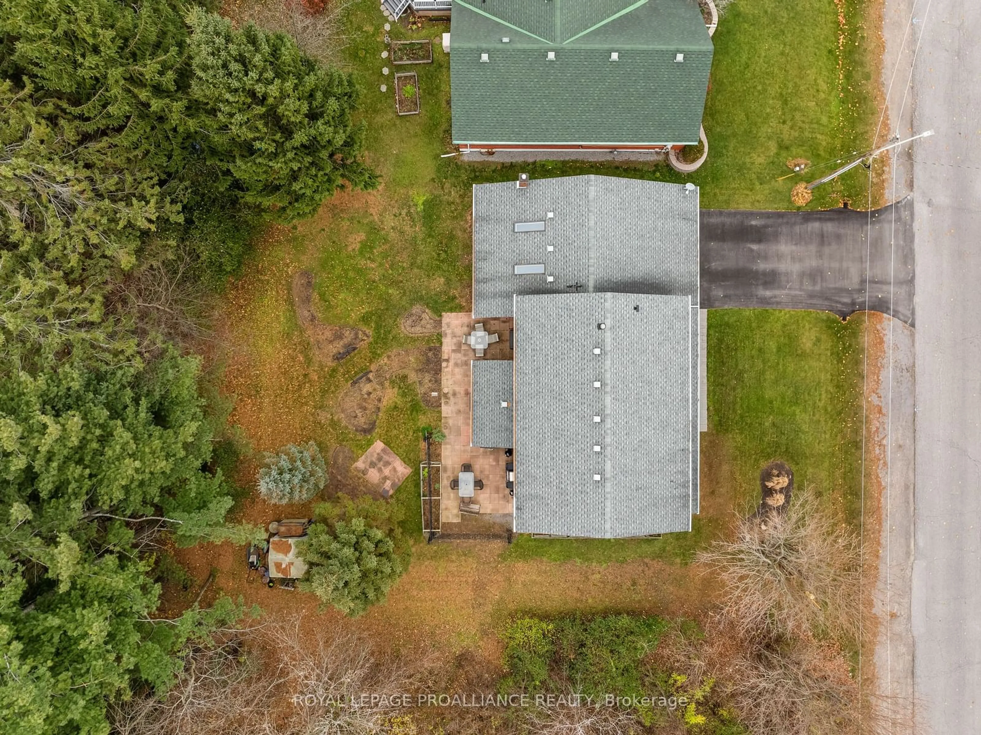 Frontside or backside of a home, the fenced backyard for 6 Mohawk Ave, Brighton Ontario K0K 1H0