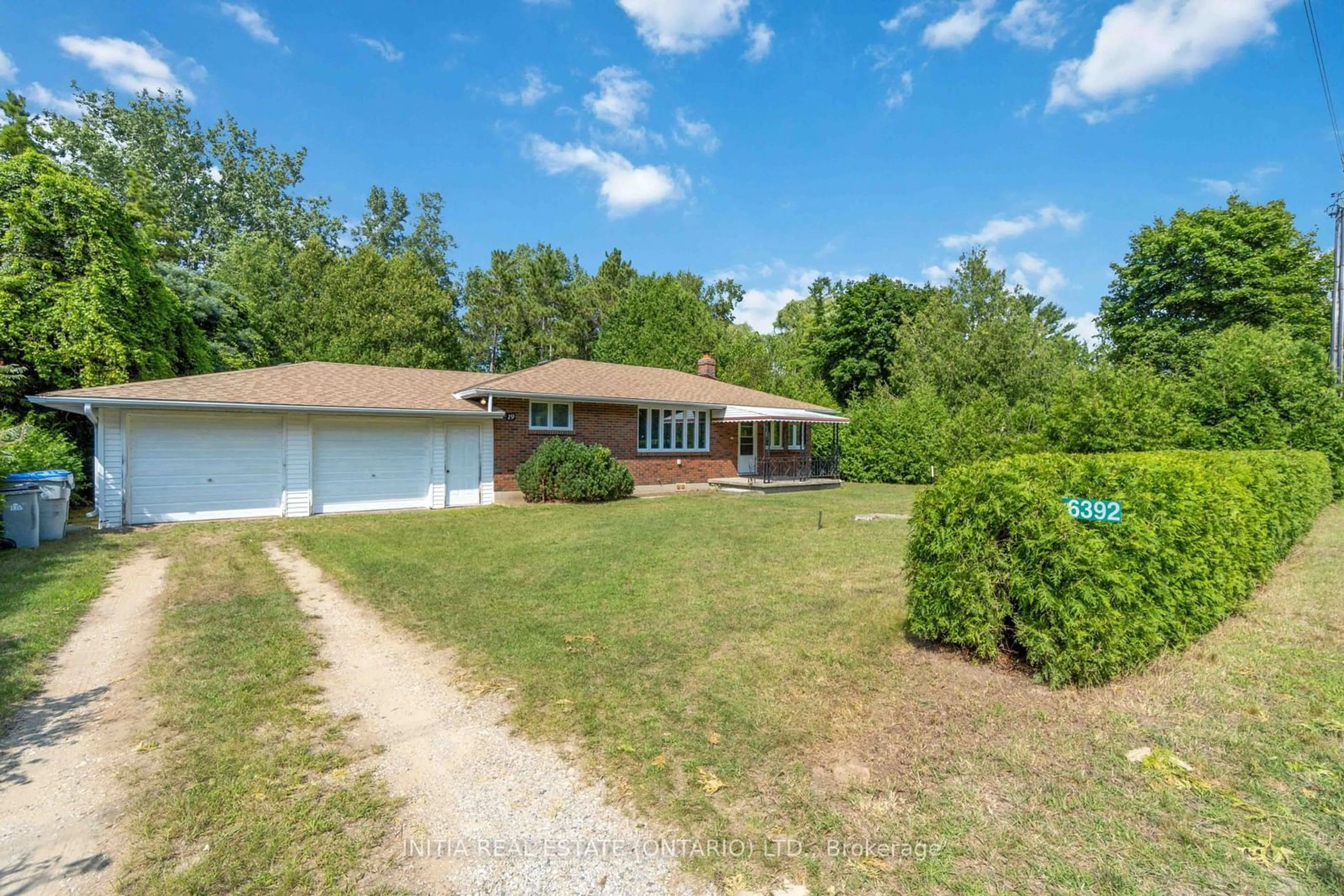 Frontside or backside of a home, the fenced backyard for 6392 Tanner Rd, Lambton Shores Ontario N0N 1J2