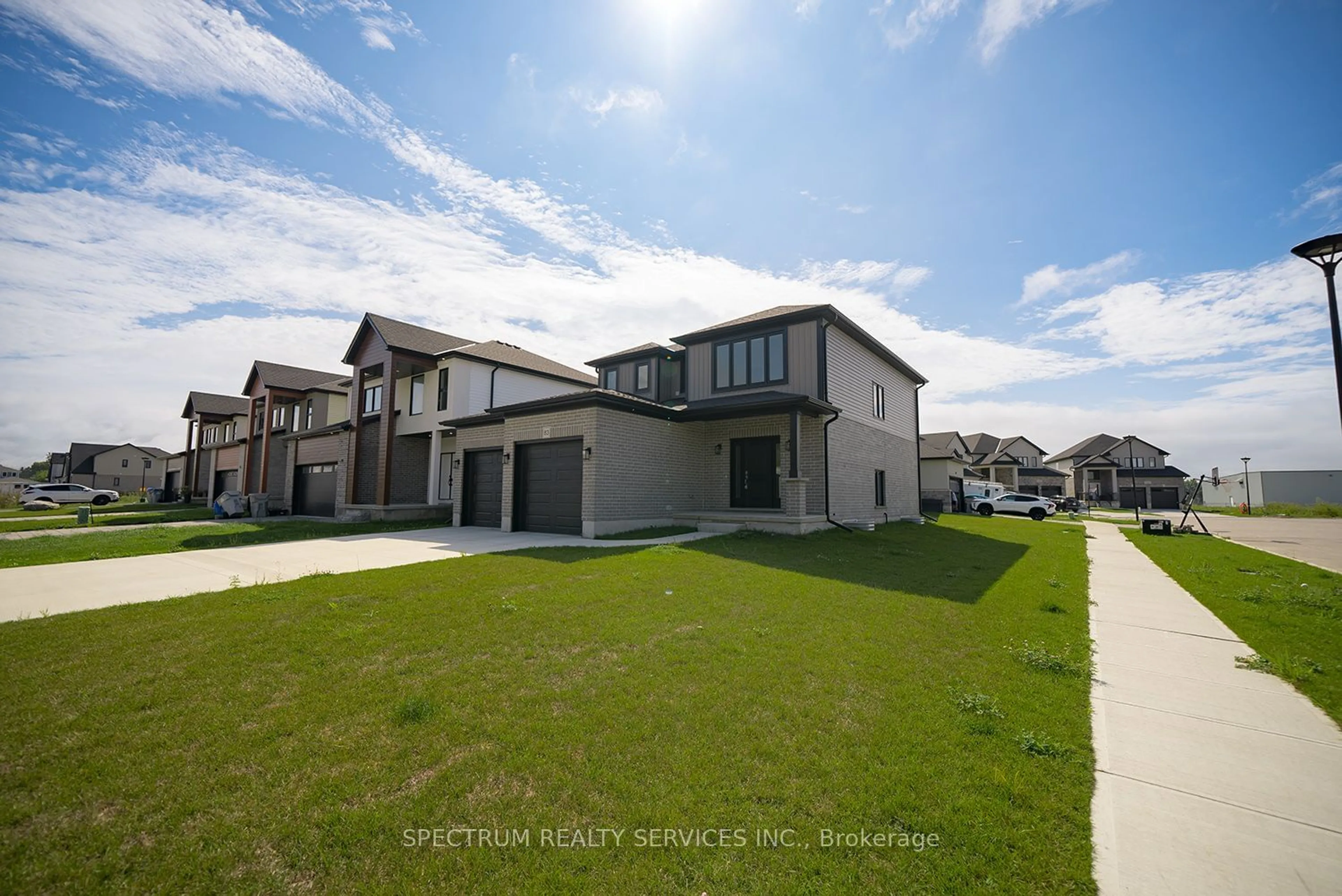 A pic from exterior of the house or condo, the fenced backyard for 83 Greene St, South Huron Ontario N0M 1S2