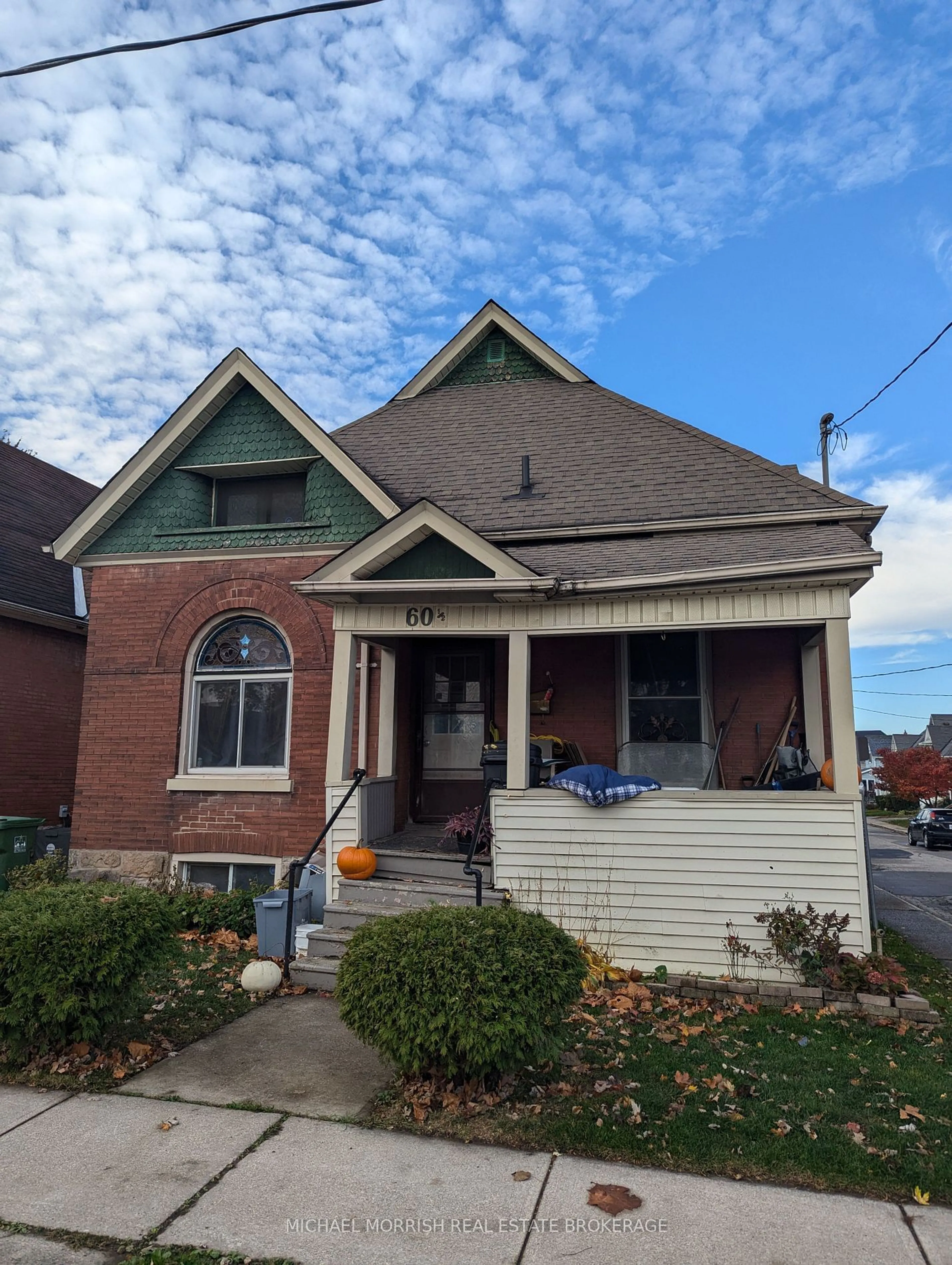 Frontside or backside of a home, the front or back of building for 60 1/2 ST CATHERINE St, St. Thomas Ontario N5P 2W1