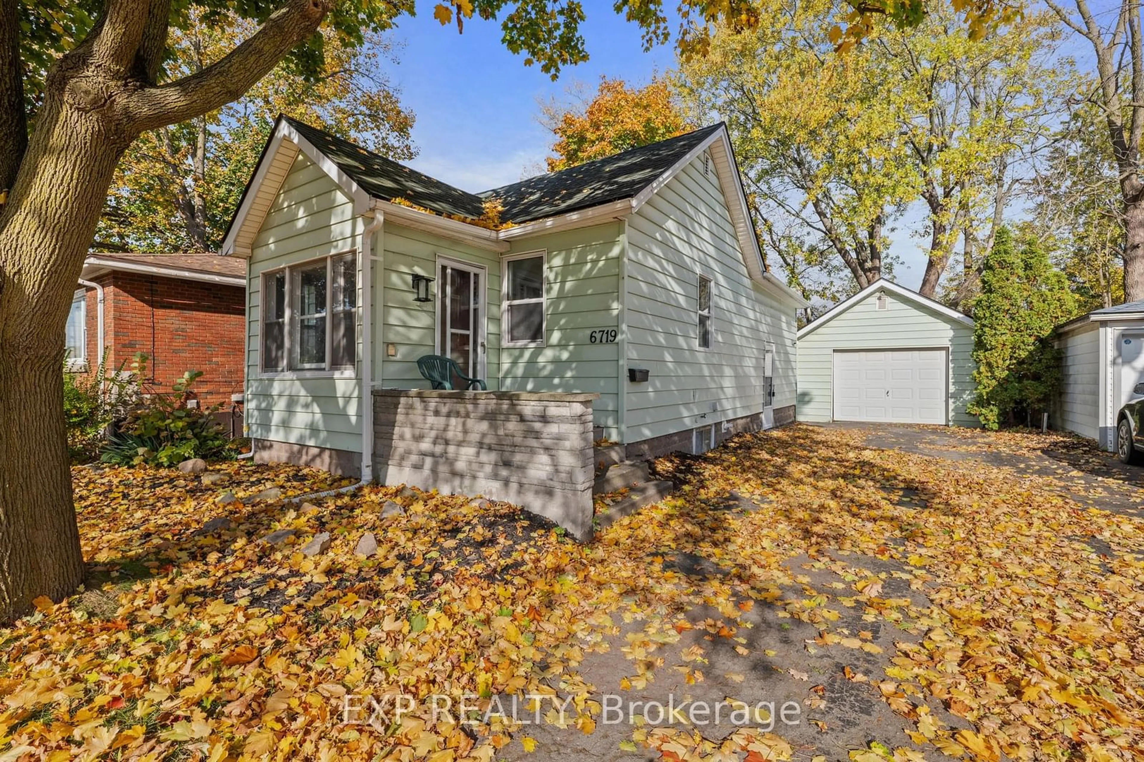 A pic from exterior of the house or condo, the fenced backyard for 6719 Dunn St, Niagara Falls Ontario L2G 2R2