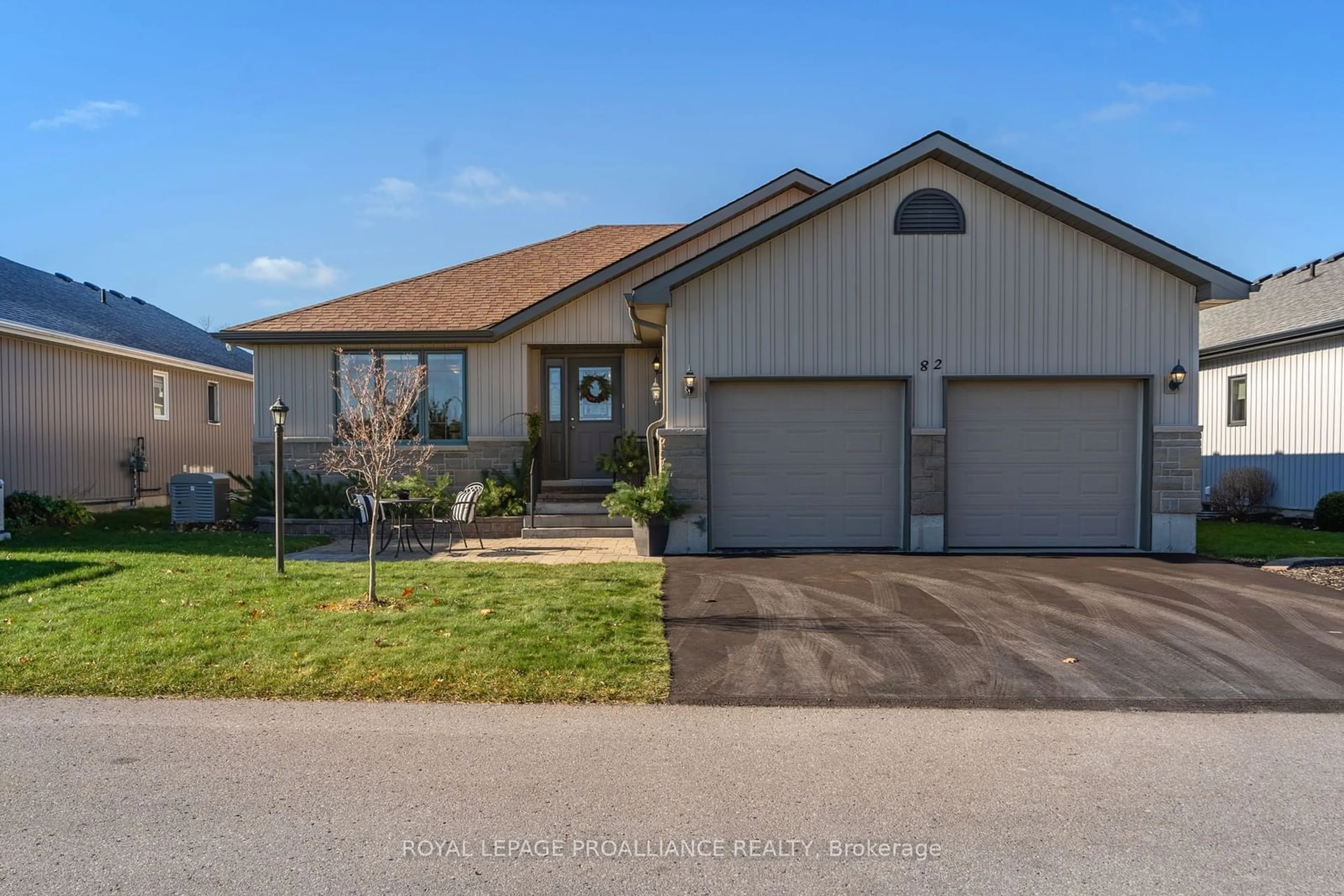 Frontside or backside of a home, the street view for 82 Dorchester Dr, Prince Edward County Ontario K0K 3L0