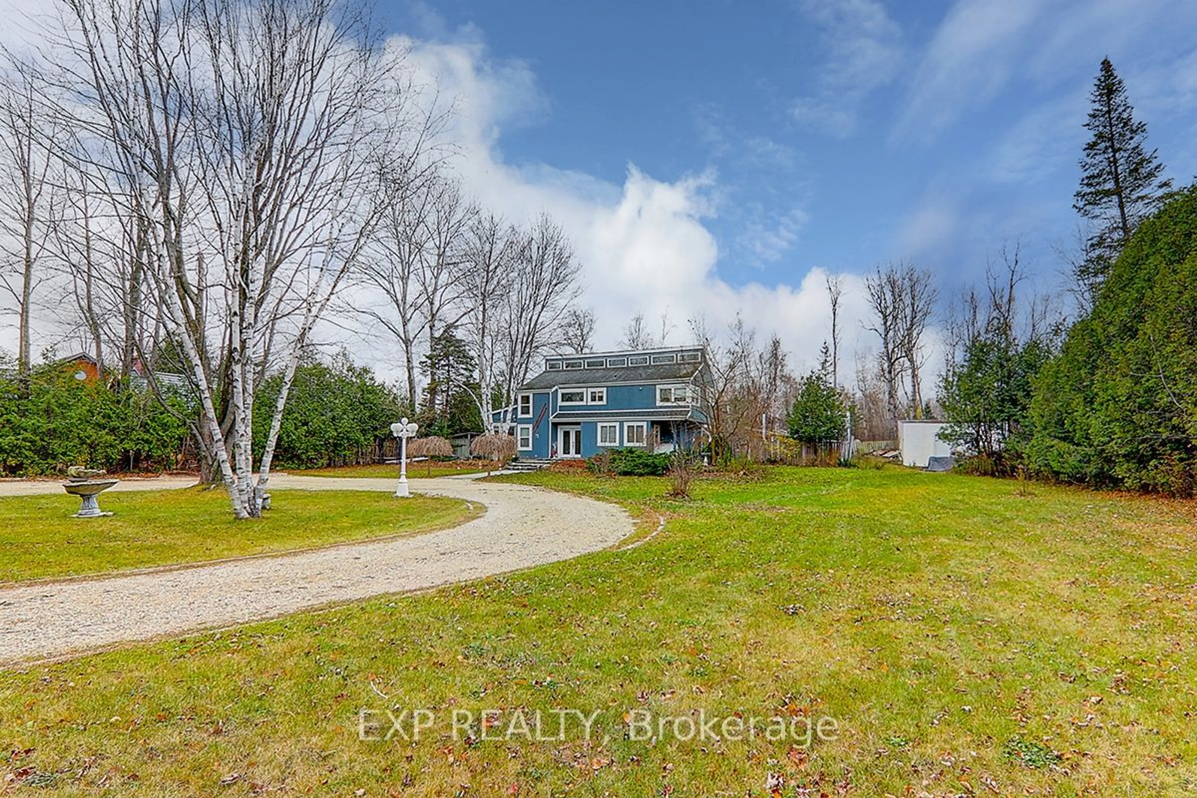 Frontside or backside of a home, the fenced backyard for 209846 Highway 26, Blue Mountains Ontario L9Y 0L1