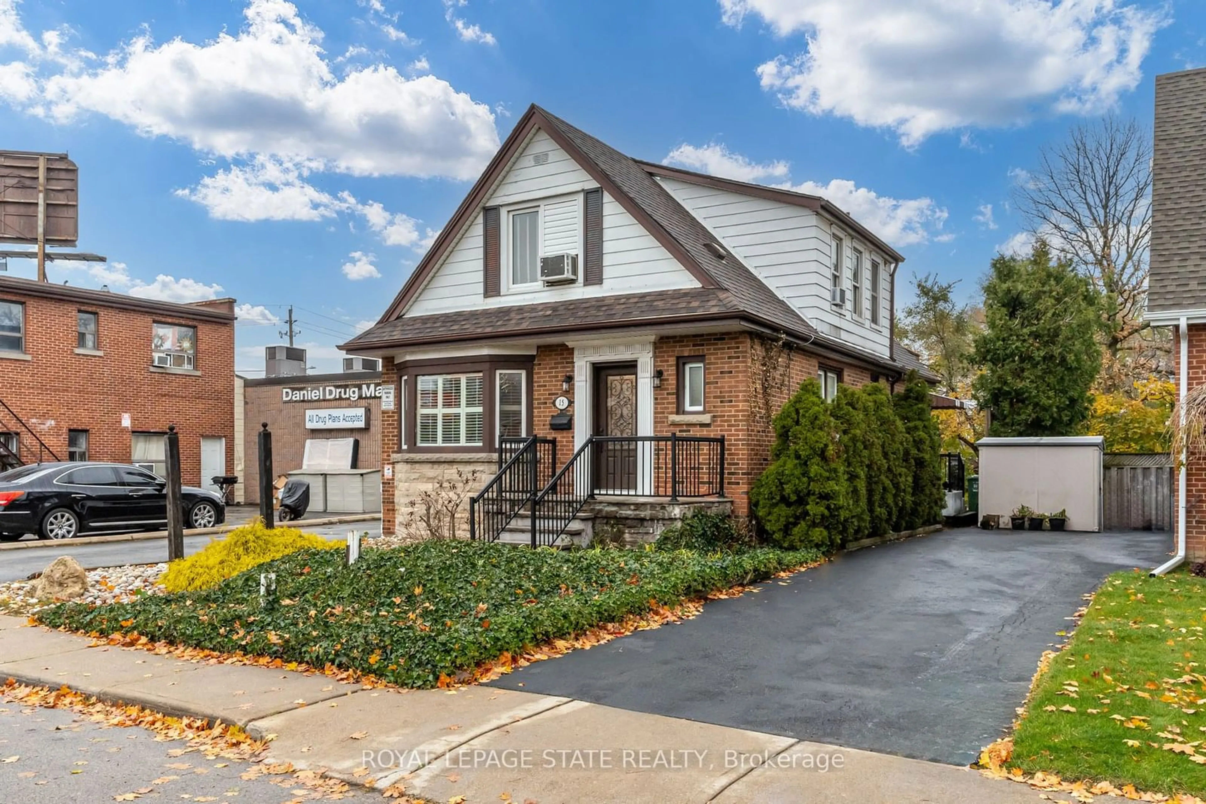 Home with brick exterior material for 15 Empress Ave, Hamilton Ontario L9A 1M1