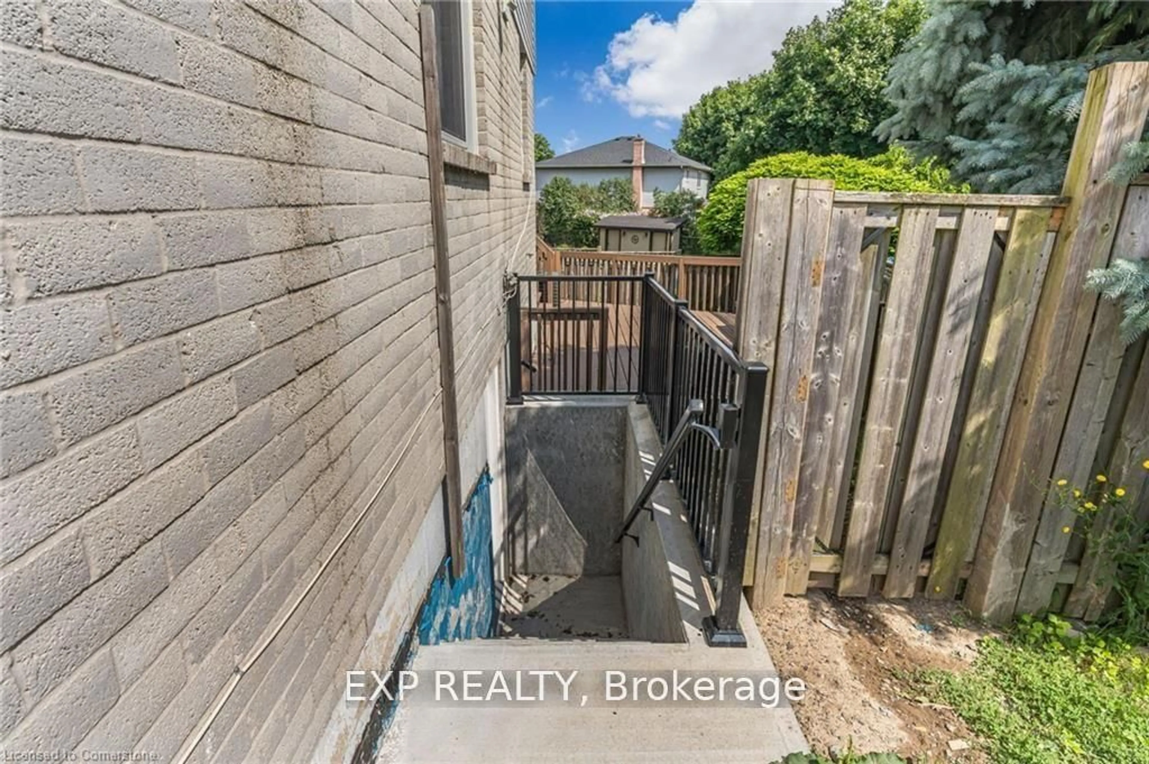 Frontside or backside of a home, the fenced backyard for 19 Driftwood Pl, Hamilton Ontario L8J 2N7