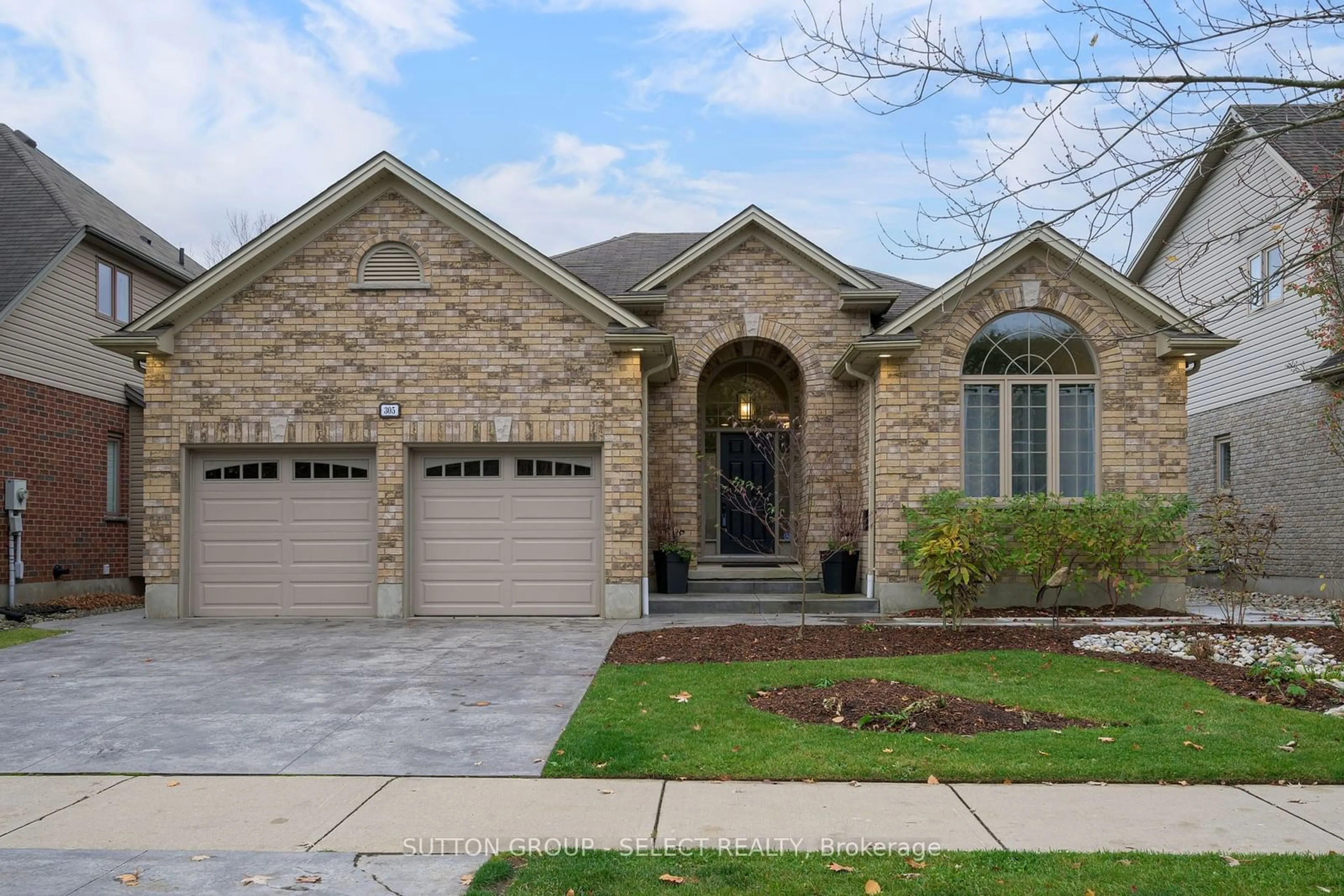 Home with brick exterior material for 305 Skyline Ave, London Ontario N5X 0A5