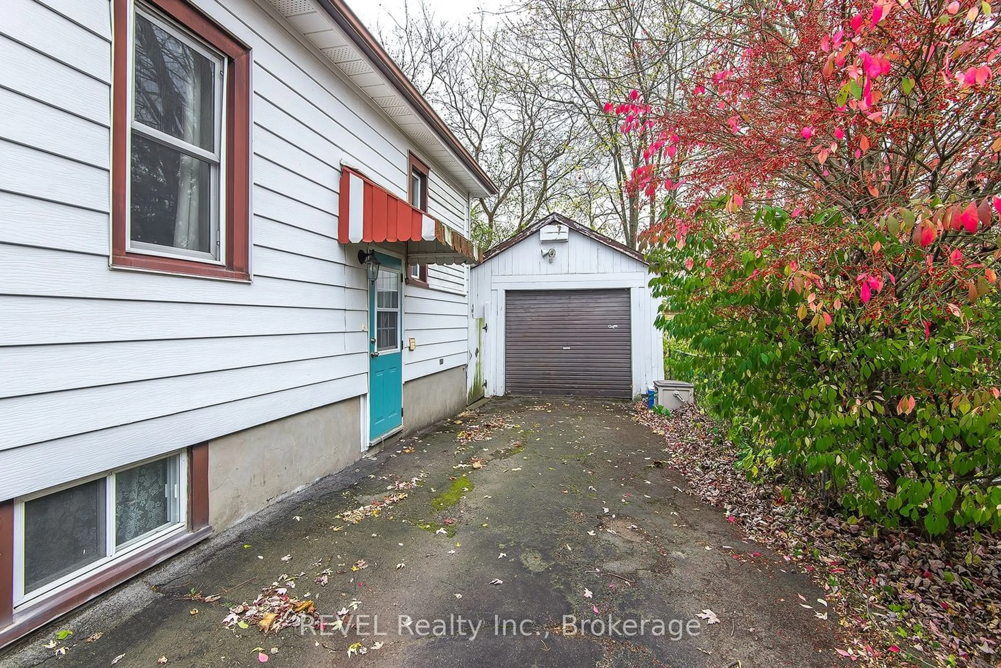 Frontside or backside of a home, the fenced backyard for 6510 Culp St, Niagara Falls Ontario L2G 2C2