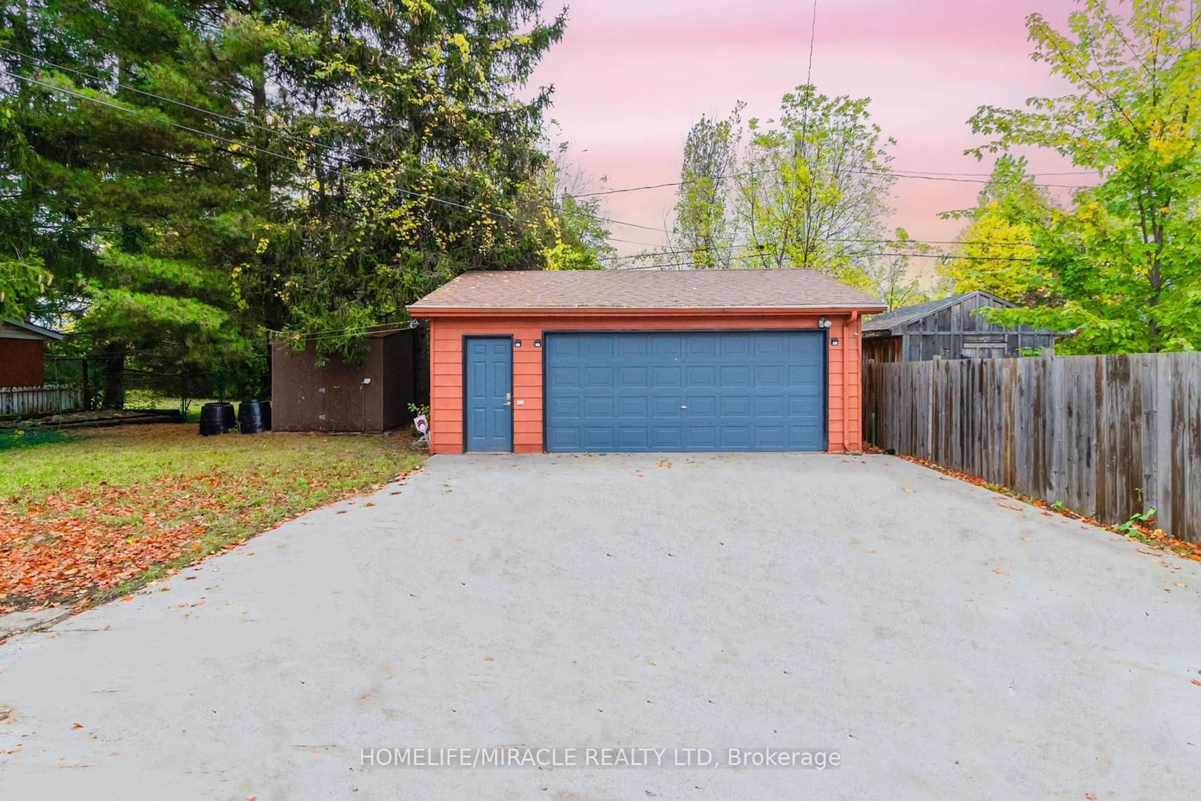 Frontside or backside of a home, the fenced backyard for 121 LAURENTIAN Dr, London Ontario N5W 1P1