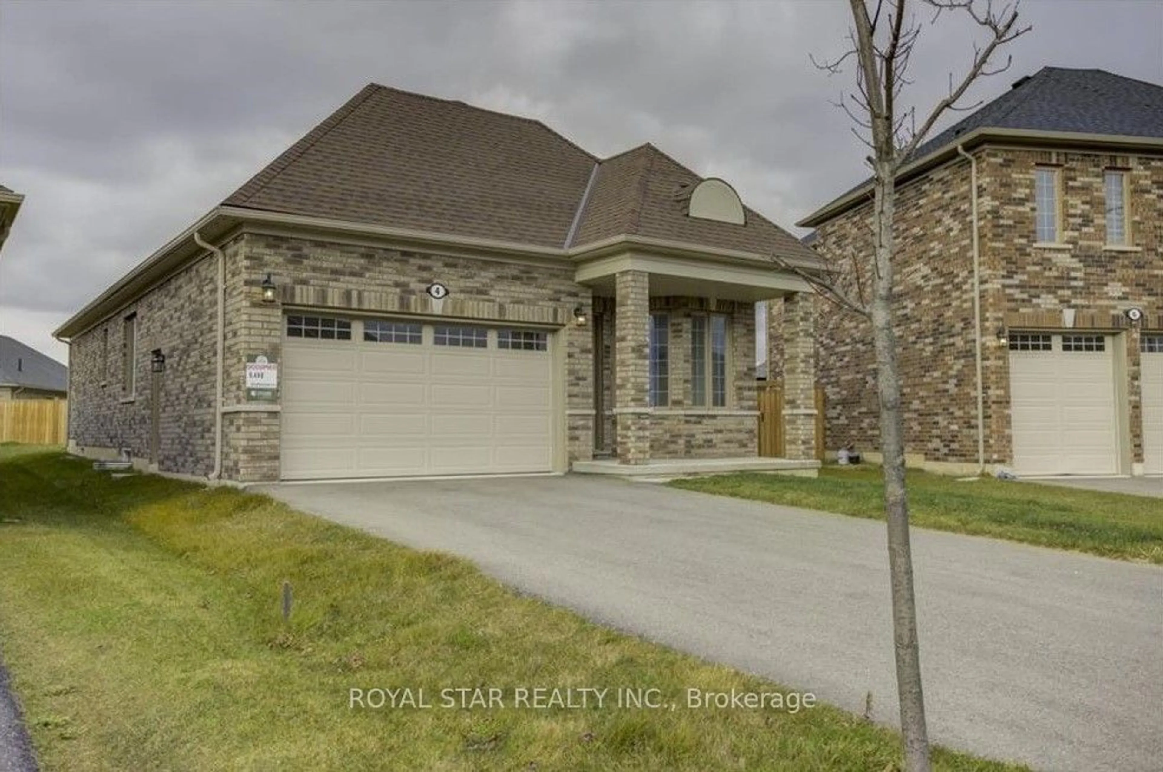 Frontside or backside of a home, the street view for 4 Harwood St, Tillsonburg Ontario N4G 0J8