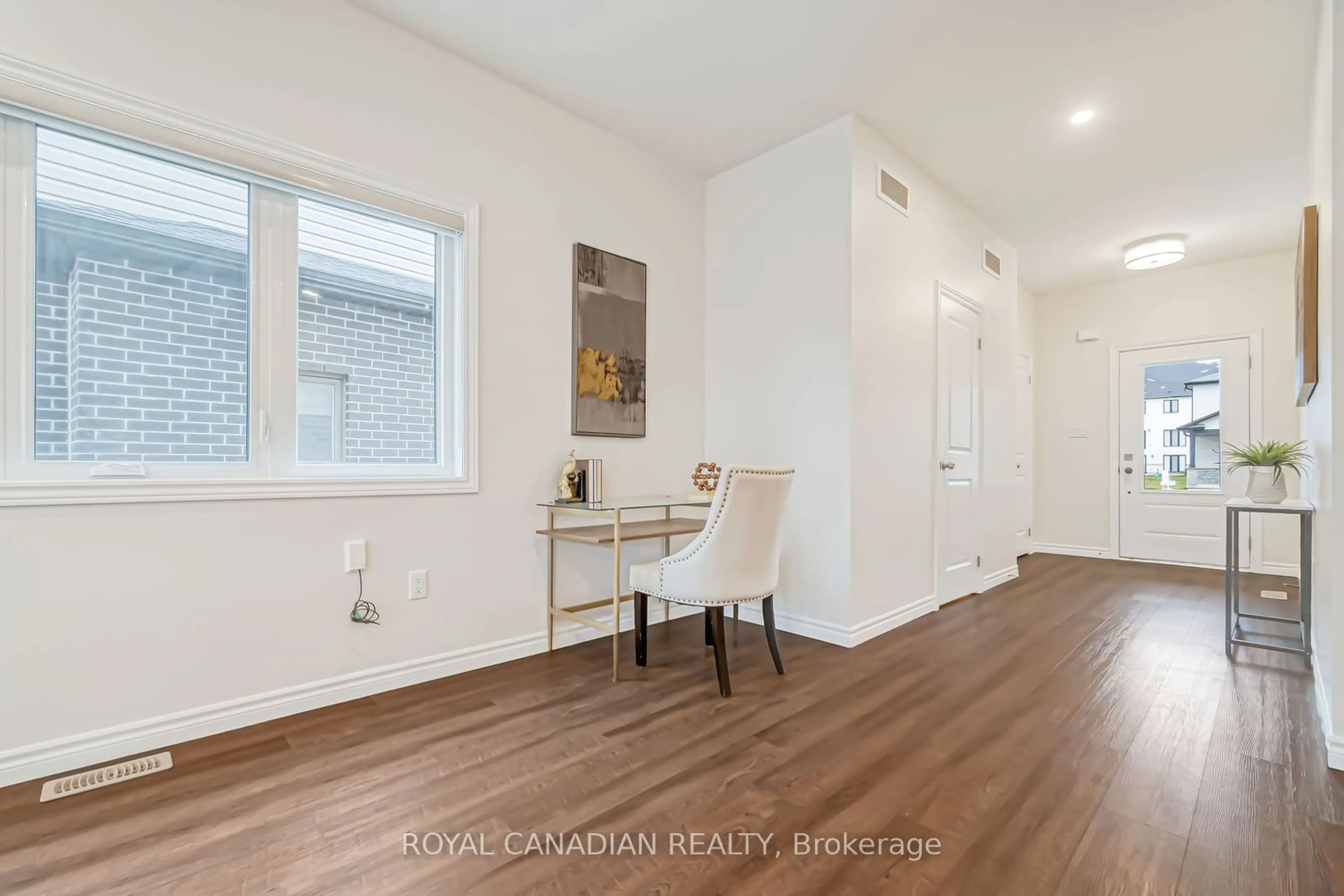 A pic of a room, wood floors for 3600 Earlston Crossing, London Ontario N6L 0G6