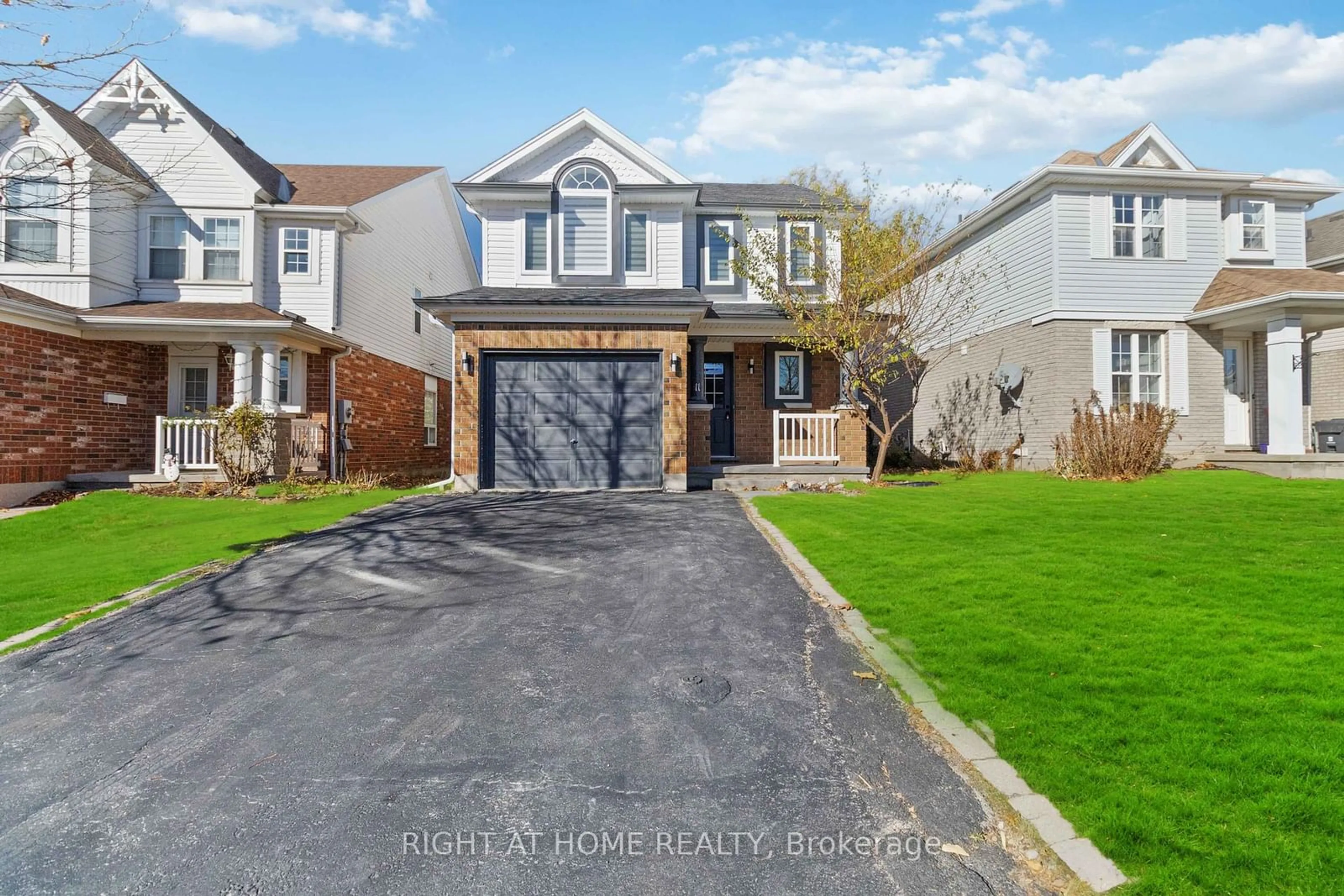 Frontside or backside of a home, the street view for 11 Southcreek Tr, Guelph Ontario N1G 4Y8