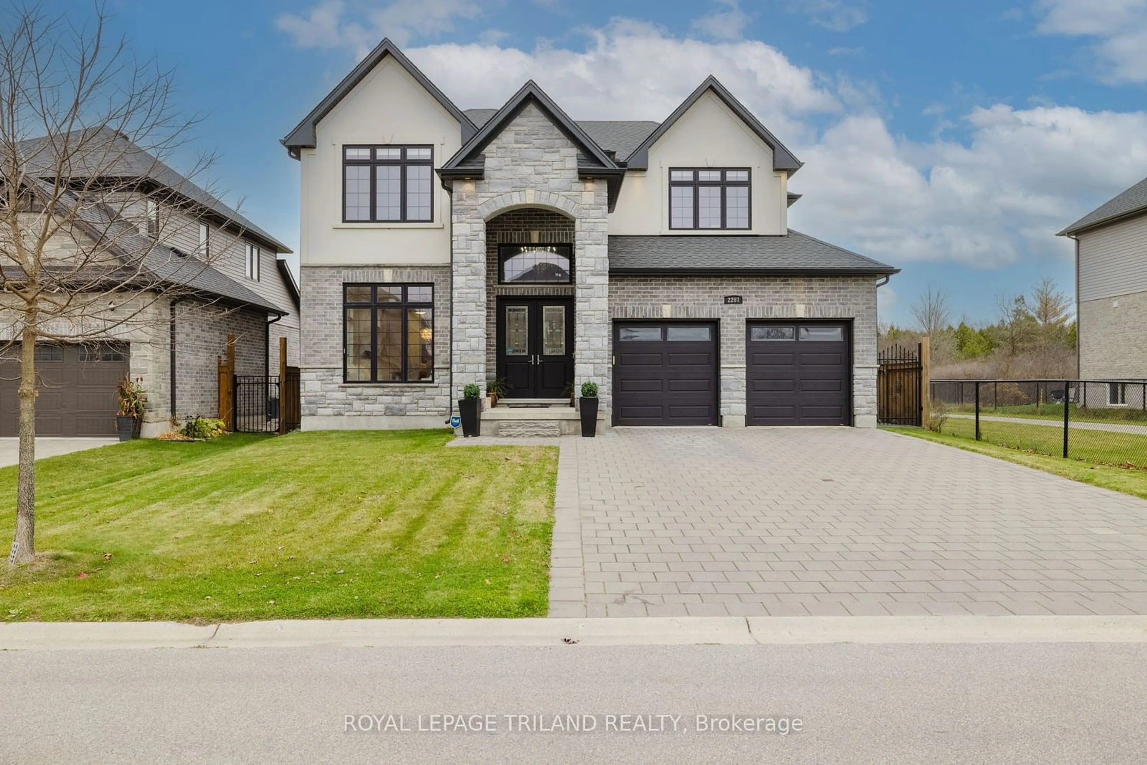 Frontside or backside of a home, the street view for 2287 Springridge Dr, London Ontario N5X 0J7