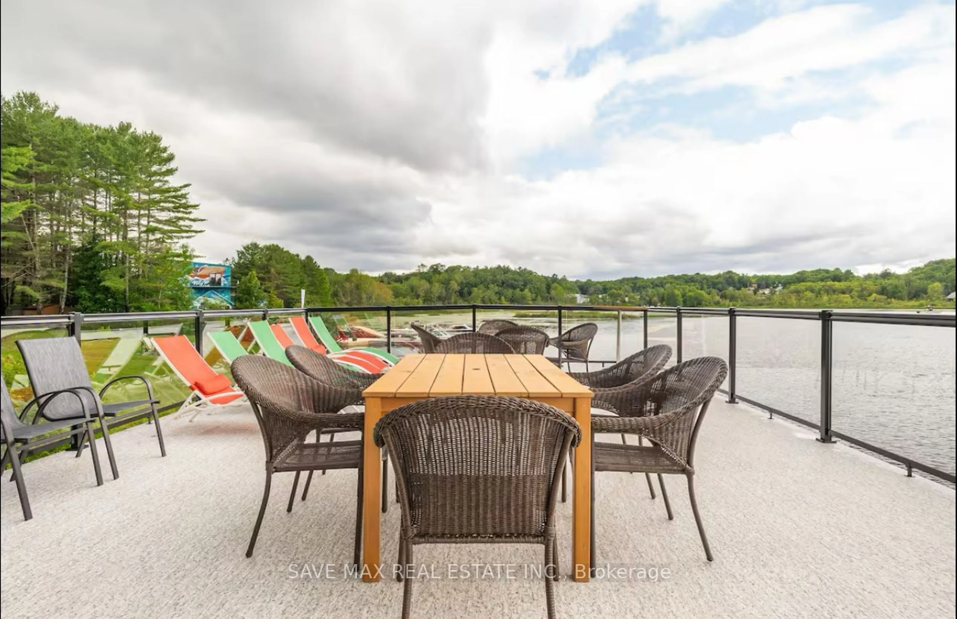 Patio, the view of lake or river for 42 Todholm Dr, Muskoka Lakes Ontario P0B 1J0