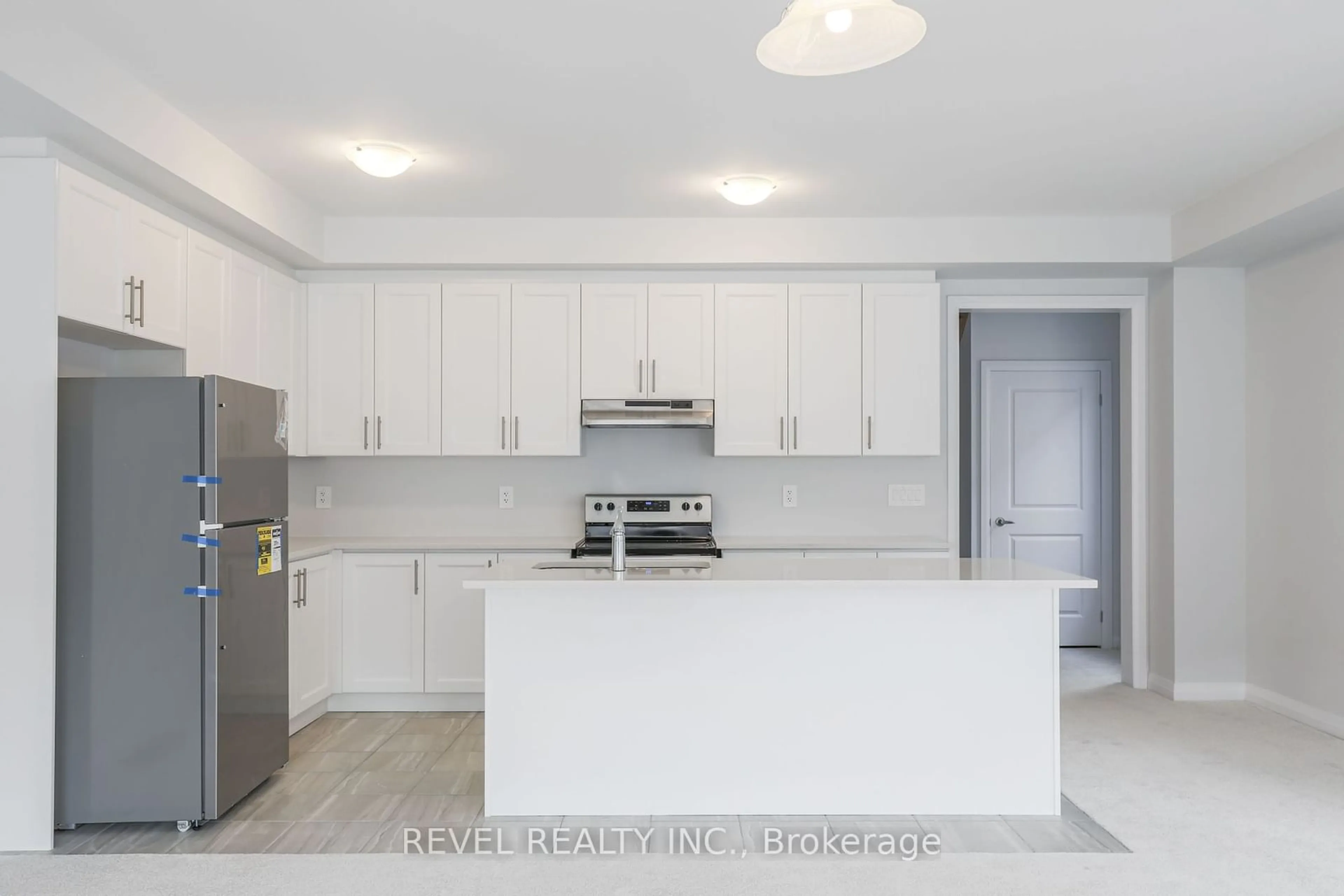 Open concept kitchen for 95 Corley St, Kawartha Lakes Ontario K9V 6C2