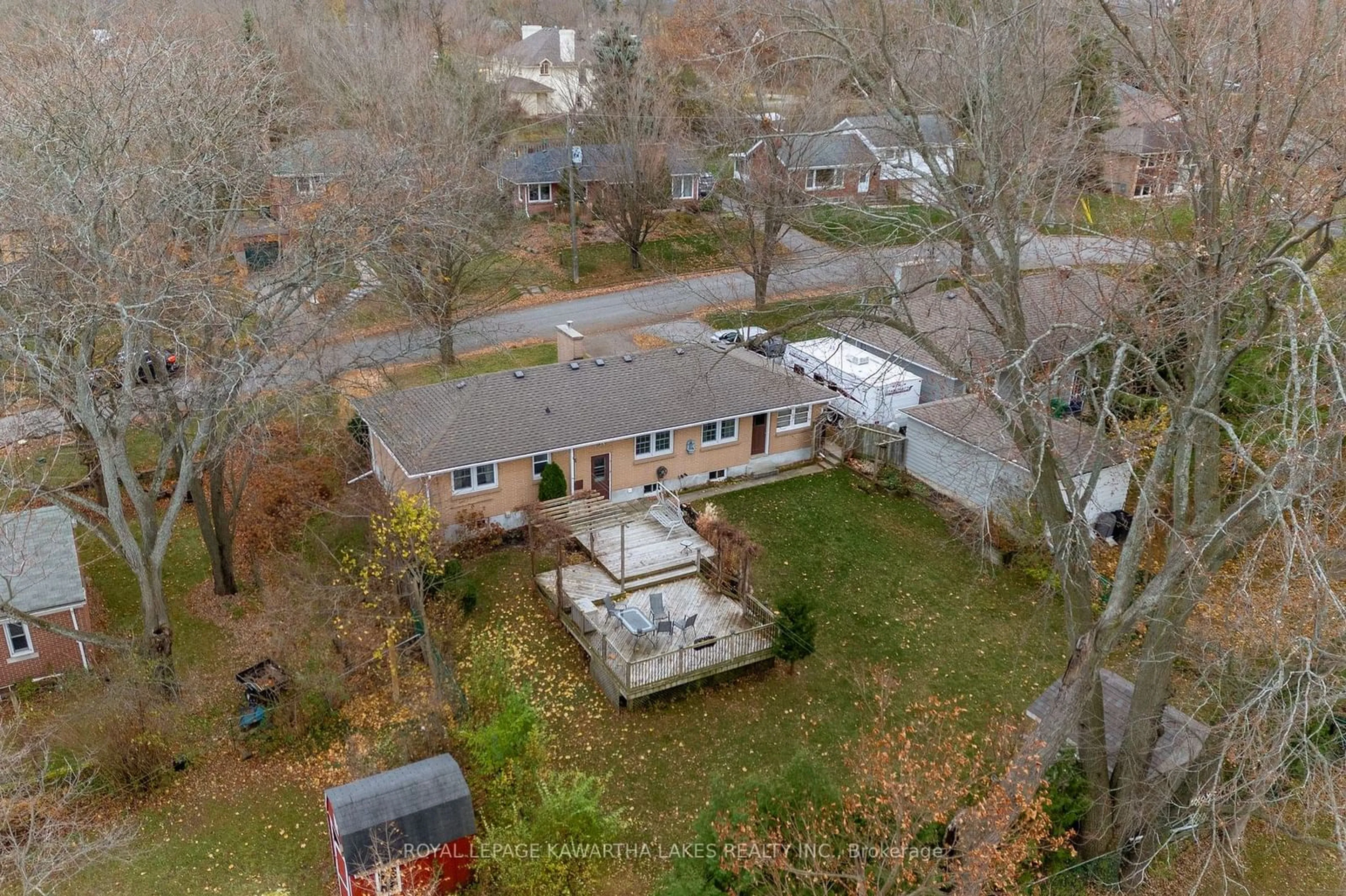 Frontside or backside of a home, the fenced backyard for 668 Stannor Dr, Peterborough Ontario K9J 4S7