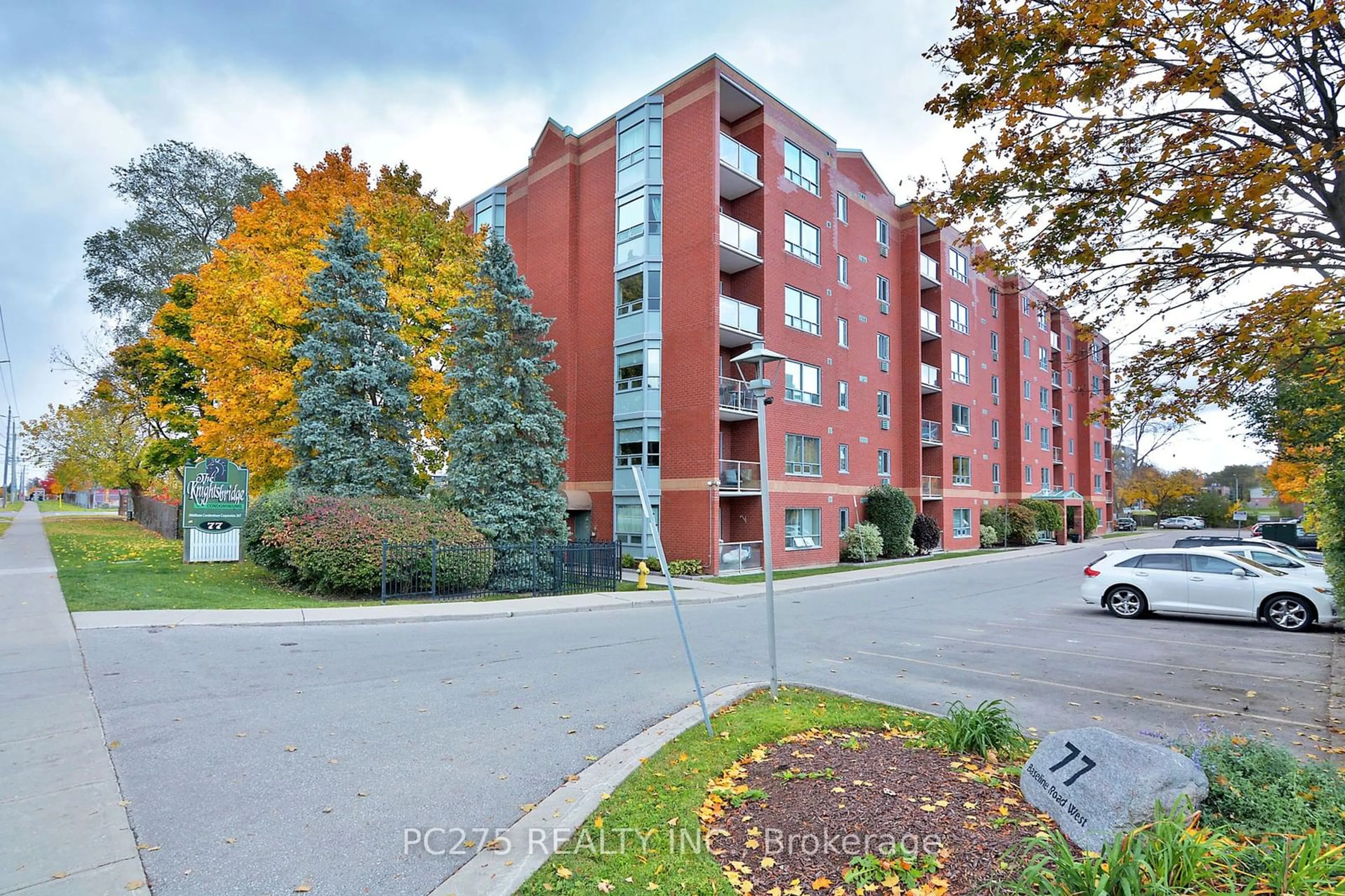 A pic from exterior of the house or condo, the street view for 77 Baseline Rd #107, London Ontario N6J 1V5