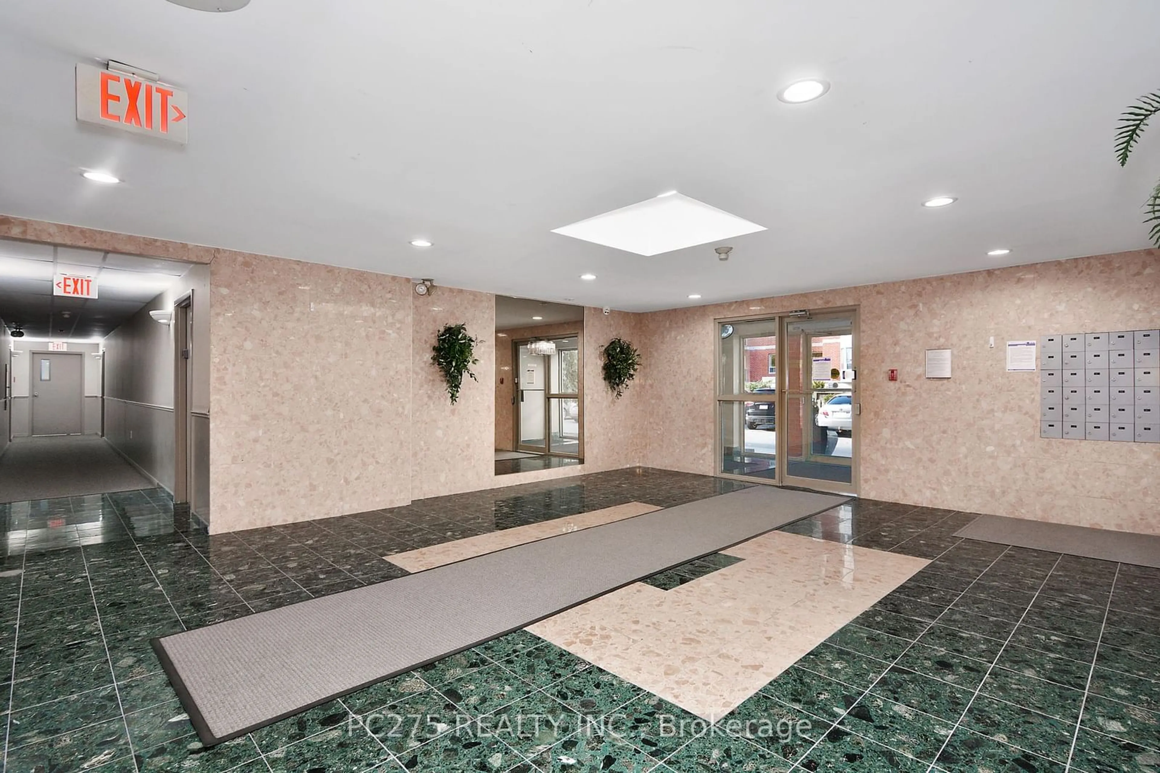 Indoor lobby, carpet floors for 77 Baseline Rd #107, London Ontario N6J 1V5