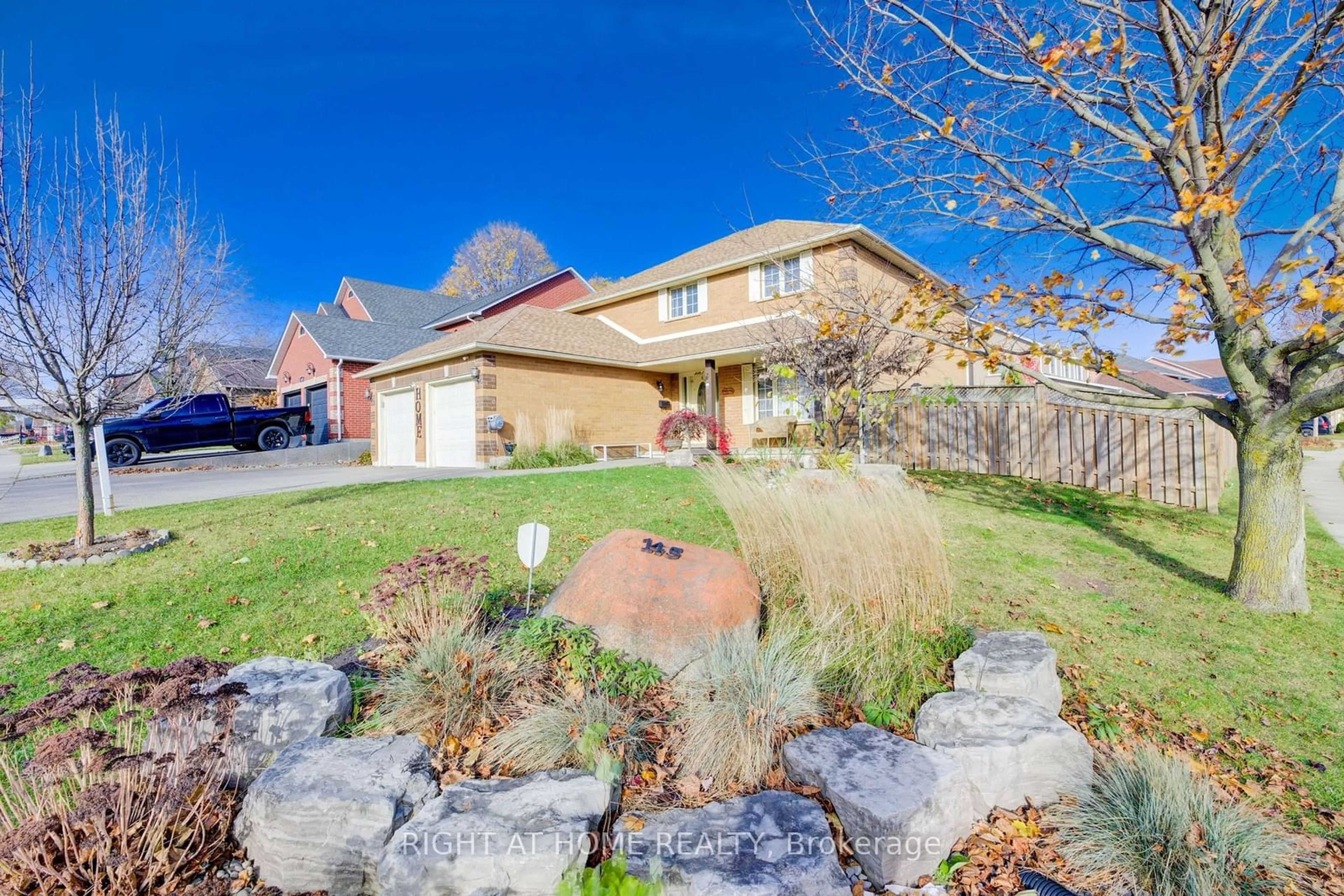 A pic from exterior of the house or condo, the fenced backyard for 145 Cowan Blvd, Cambridge Ontario N1T 1K9