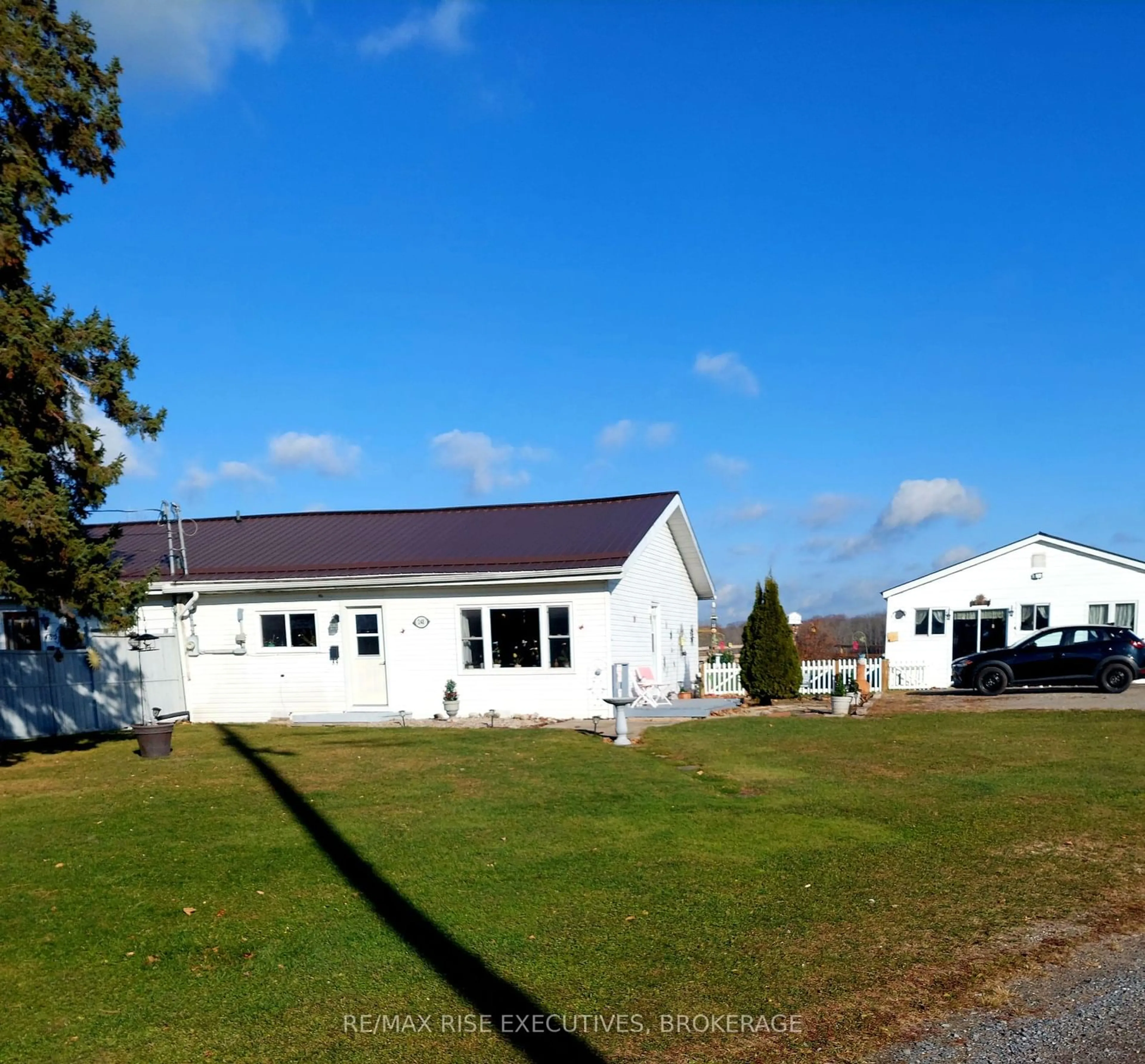 Frontside or backside of a home, the front or back of building for 248 Cemetery Rd, Gananoque Ontario K7G 1V8