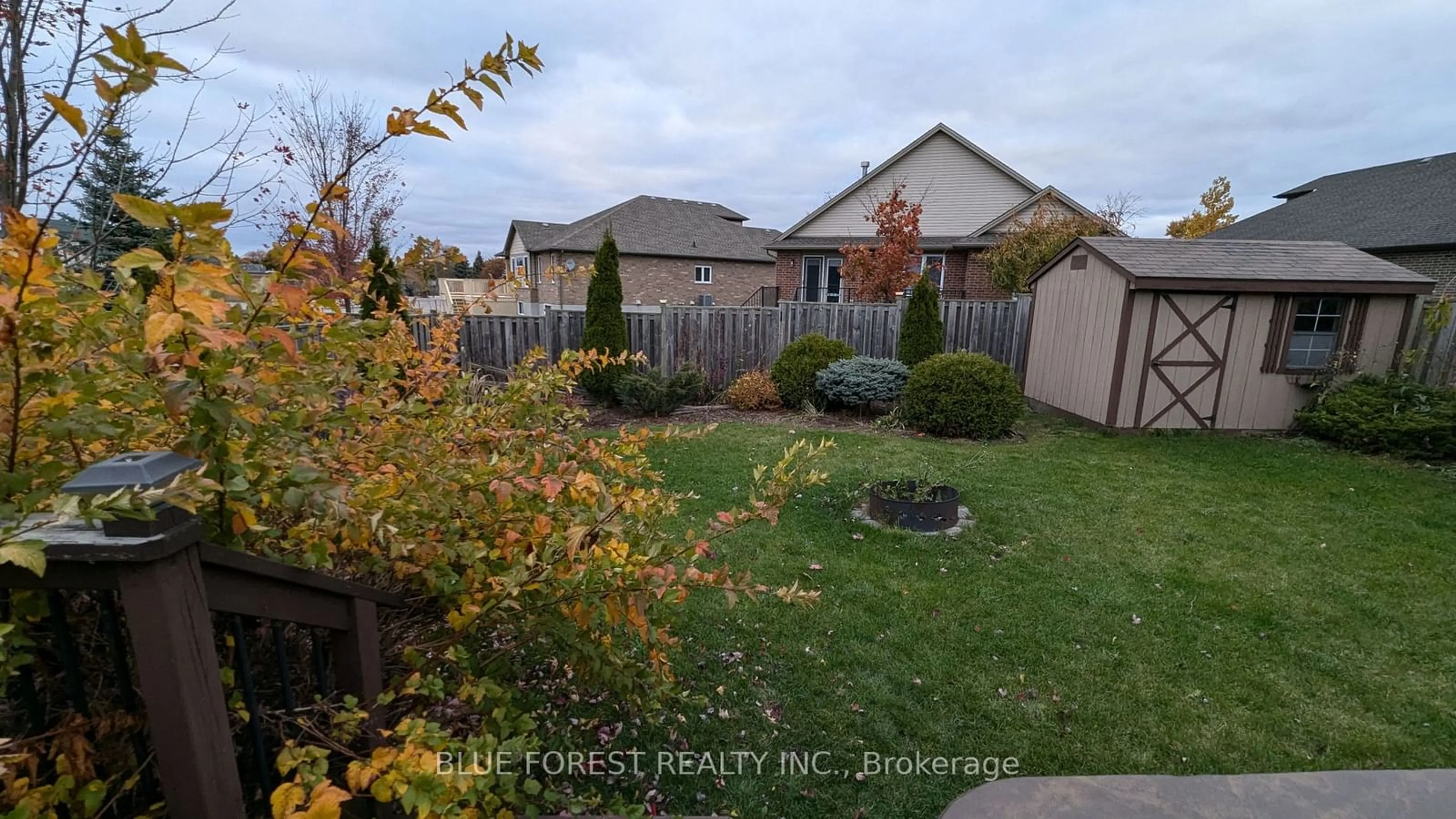 Frontside or backside of a home, the fenced backyard for 19 Lawrence Ave, St. Thomas Ontario N5R 4Y7