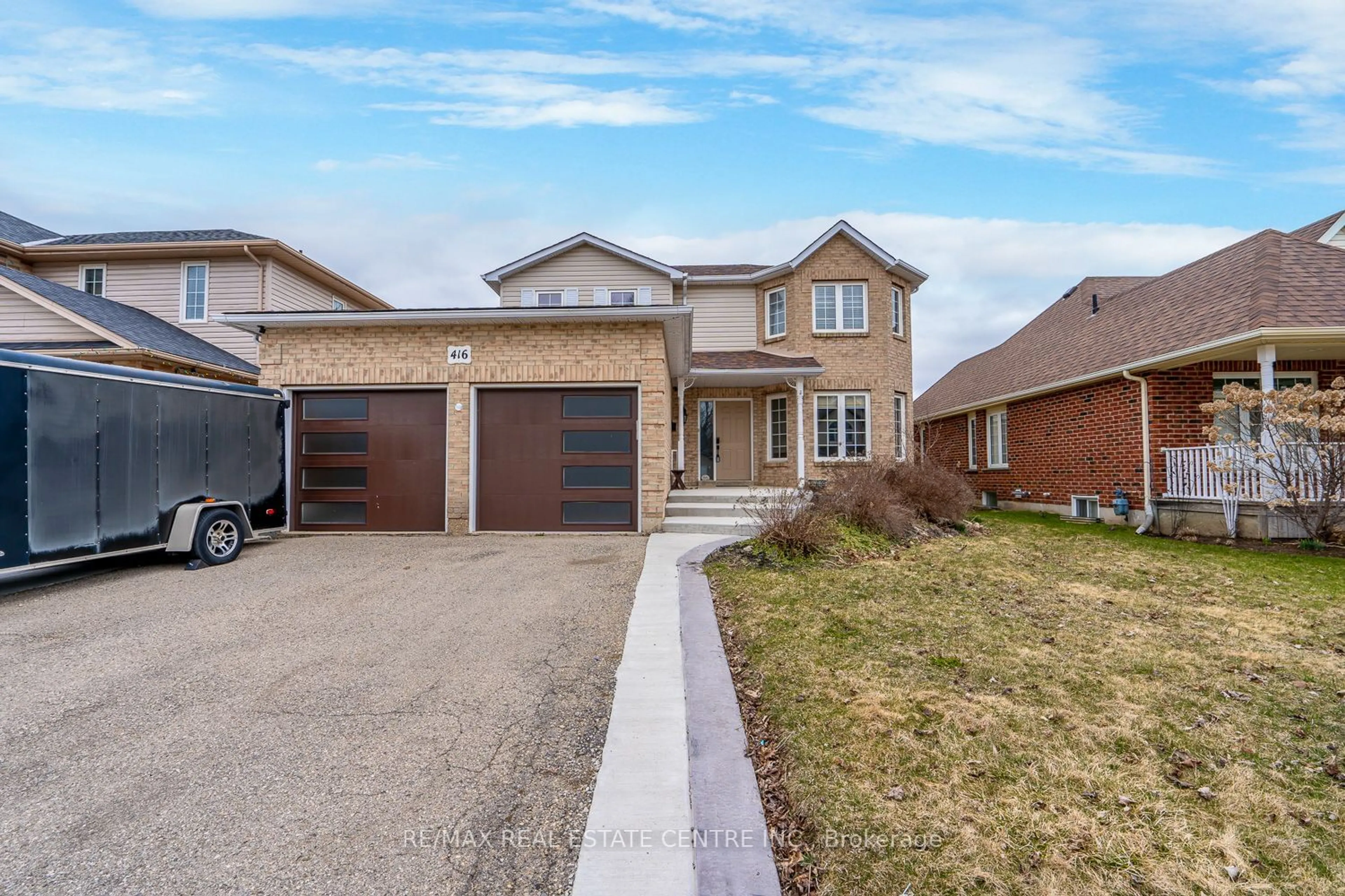 Frontside or backside of a home, the street view for 416 Olde Village Lane, Shelburne Ontario L9V 3A4