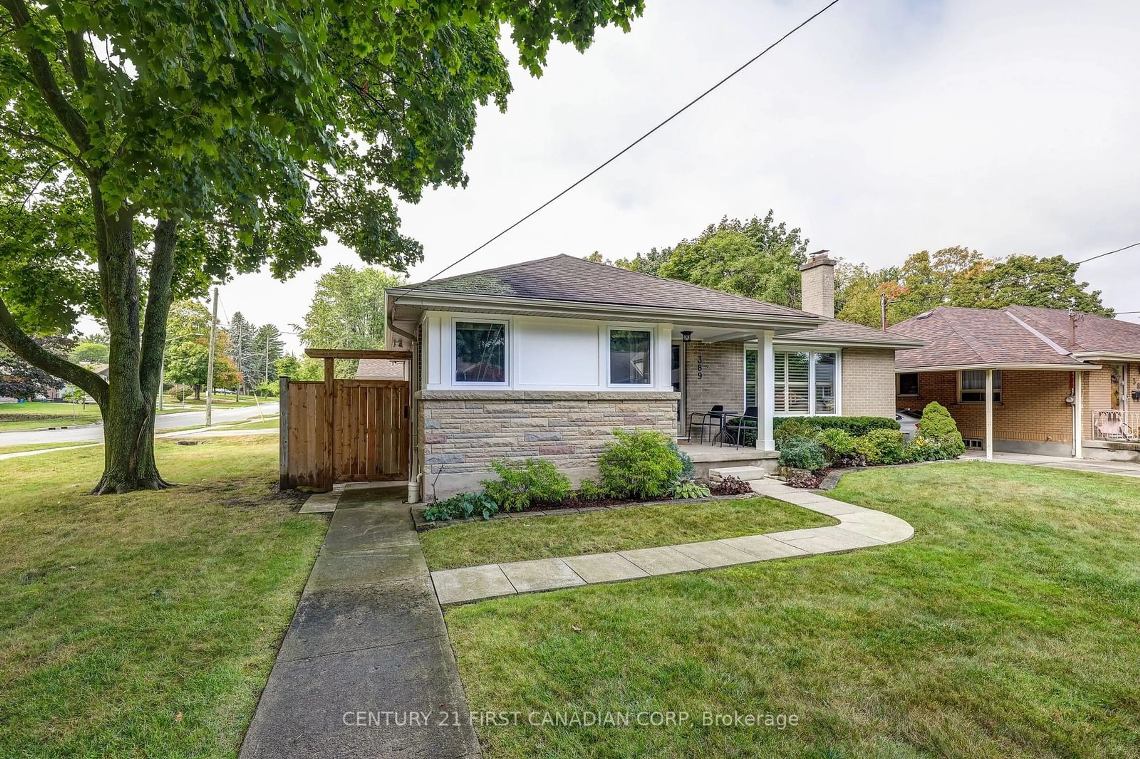 Frontside or backside of a home, the fenced backyard for 389 MCKEON Ave, London Ontario N6C 4H4