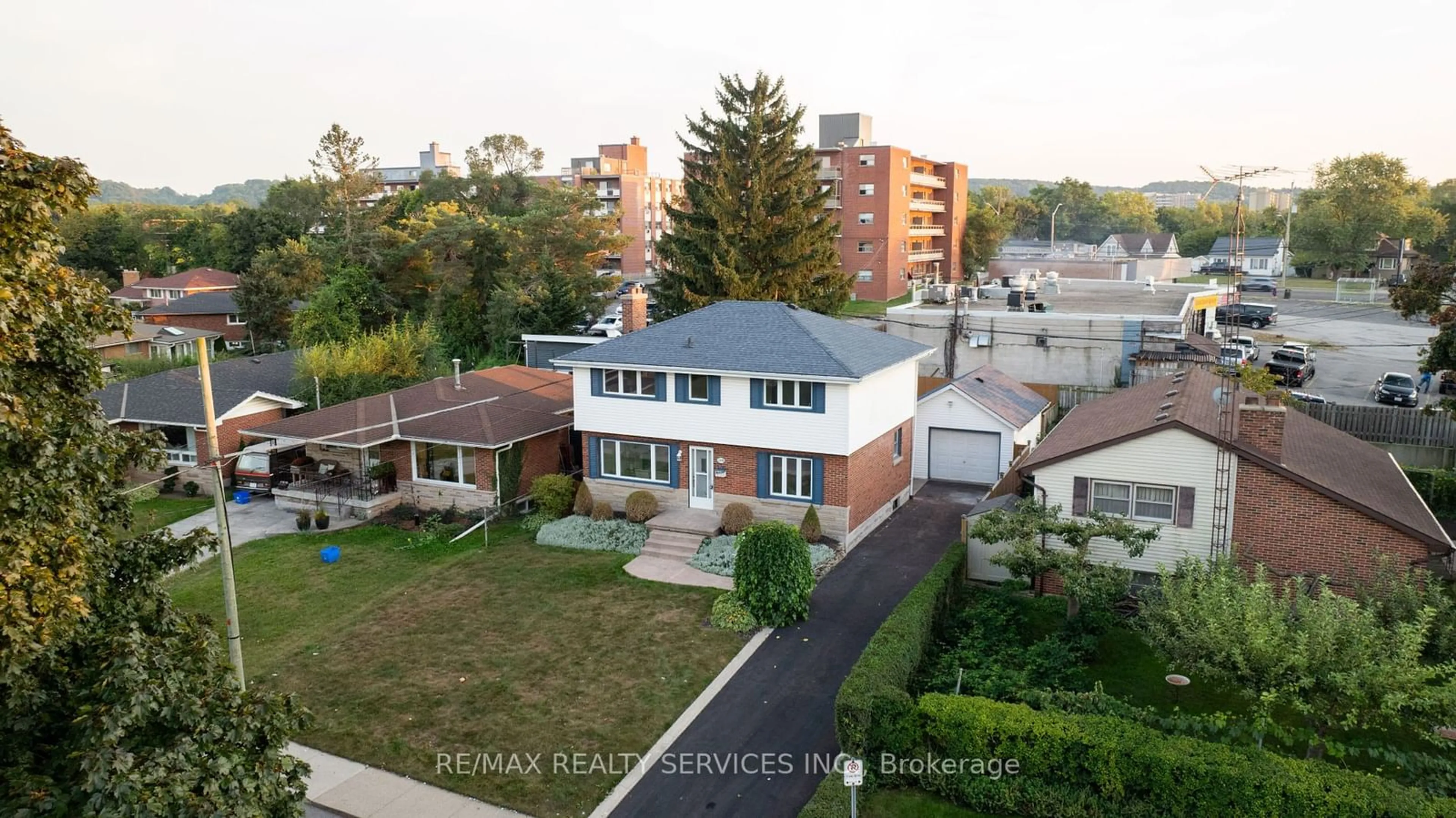 A pic from exterior of the house or condo, the fenced backyard for 54 Orphir Rd, Hamilton Ontario L8K 3Z2